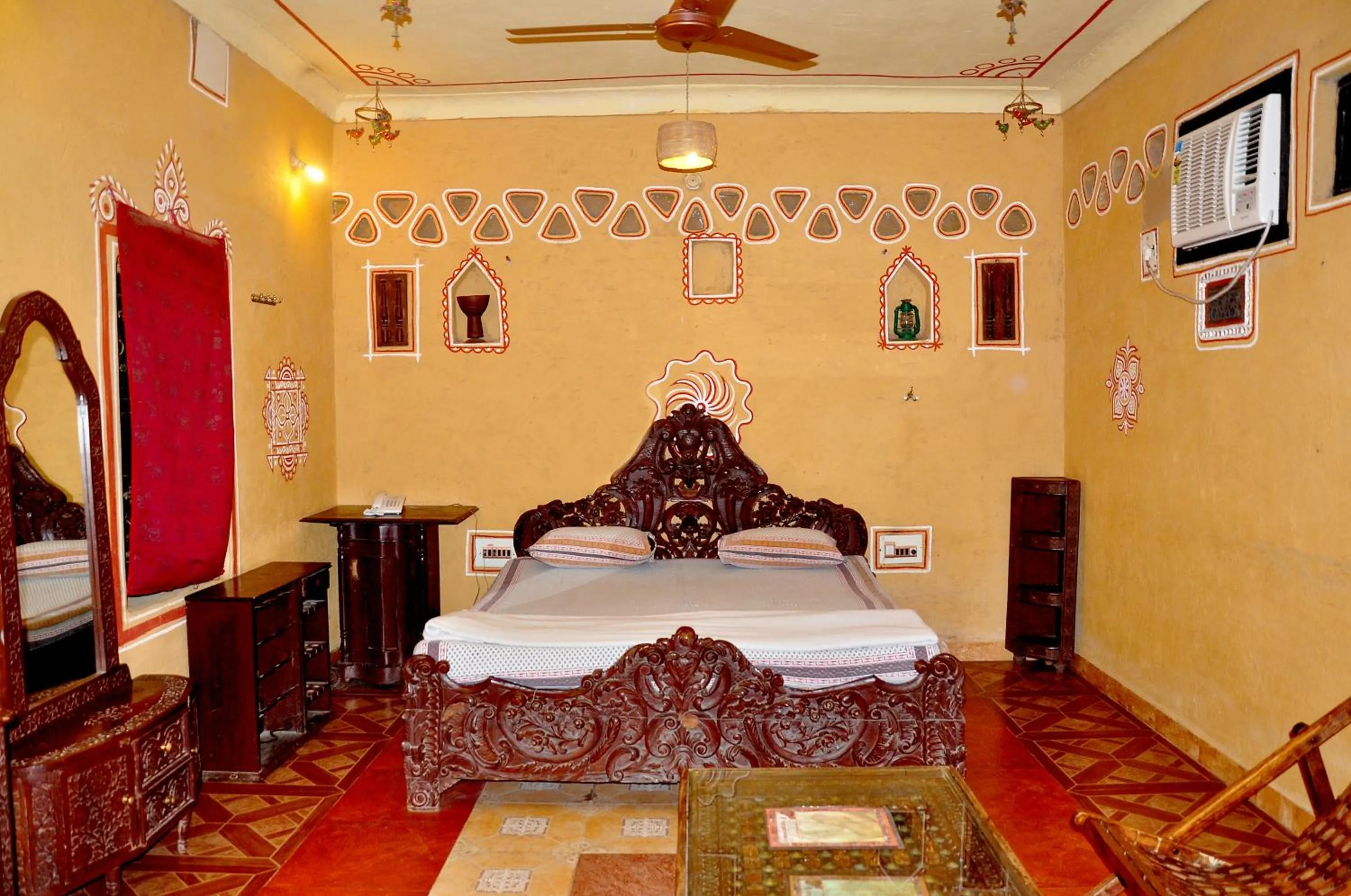 Bed in Nakhrali Dhani Resort