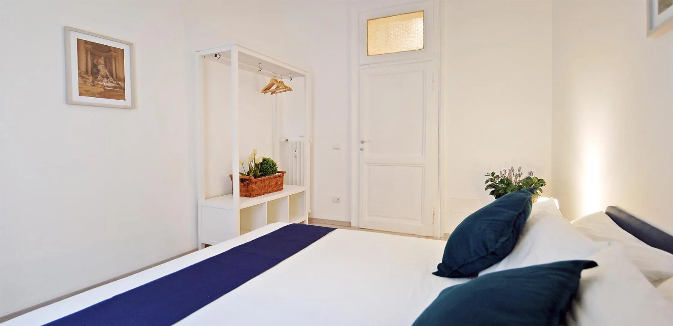 Bed in Pompeo Magno White Luxury Apartment
