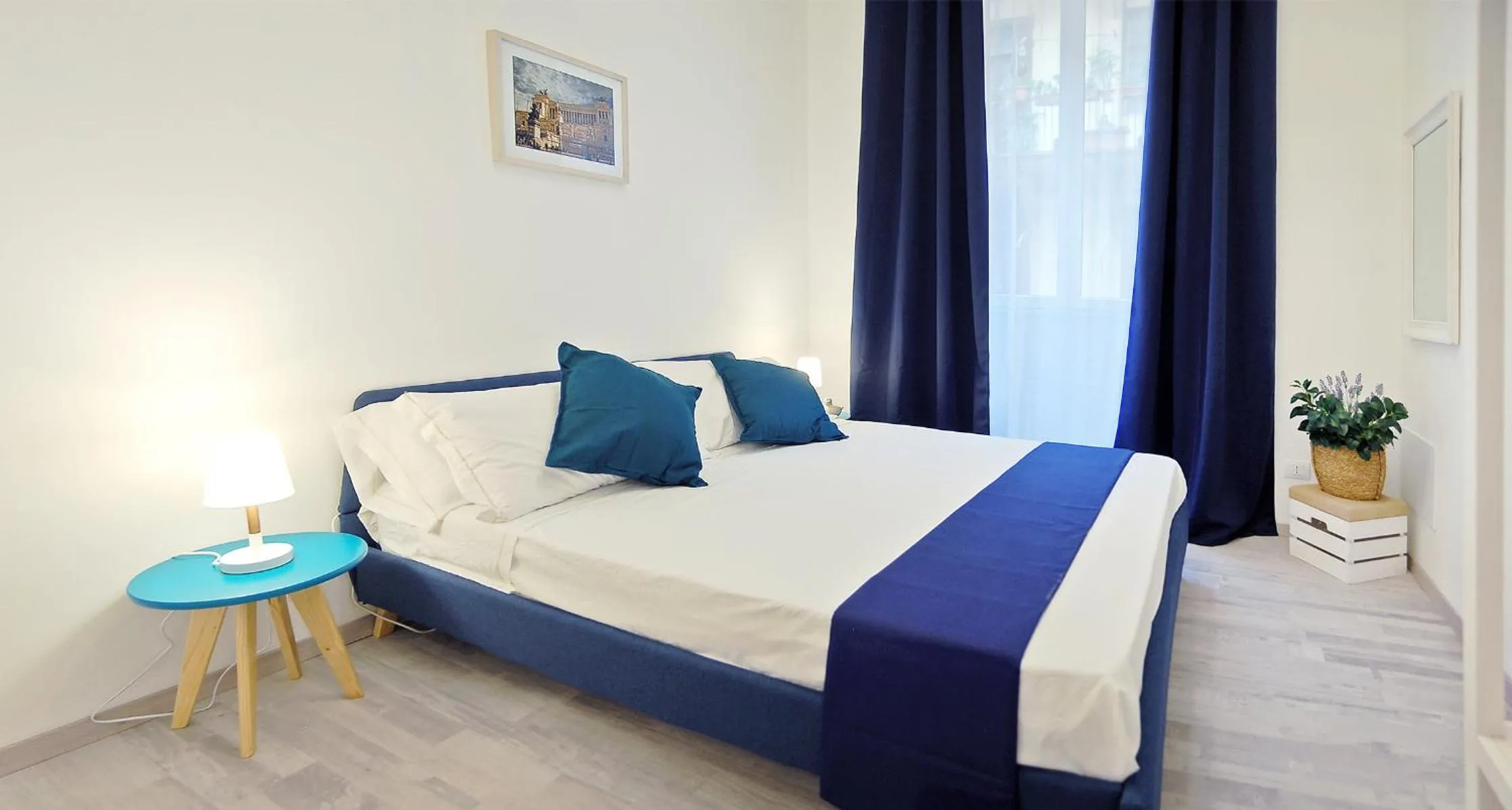 Bed in Pompeo Magno White Luxury Apartment