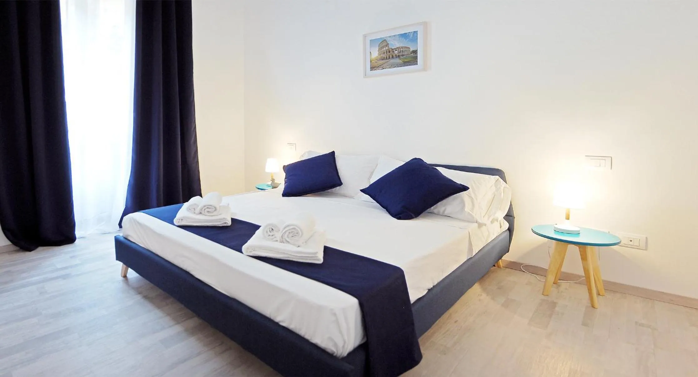 Bed in Pompeo Magno White Luxury Apartment