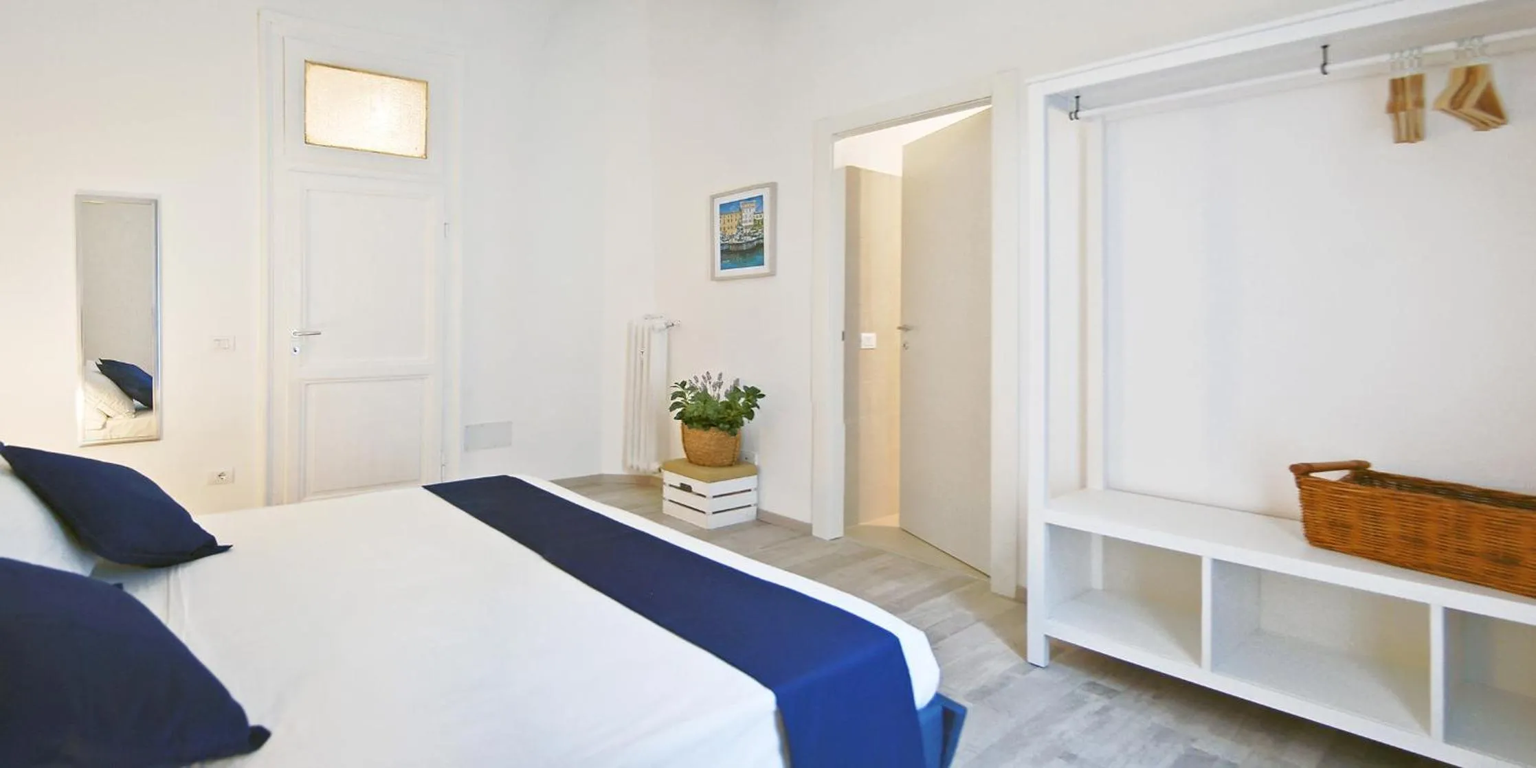 Bed in Pompeo Magno White Luxury Apartment