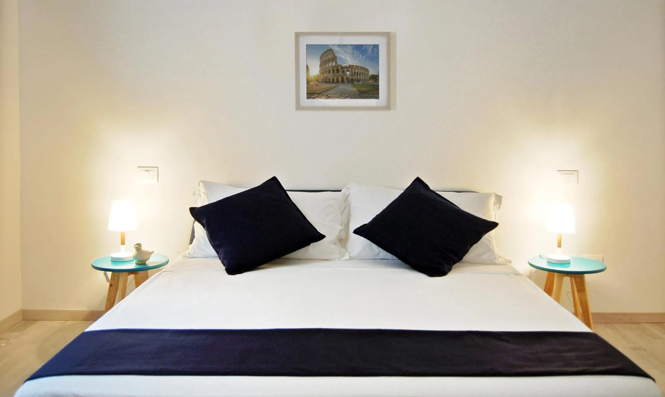 Bed in Pompeo Magno White Luxury Apartment