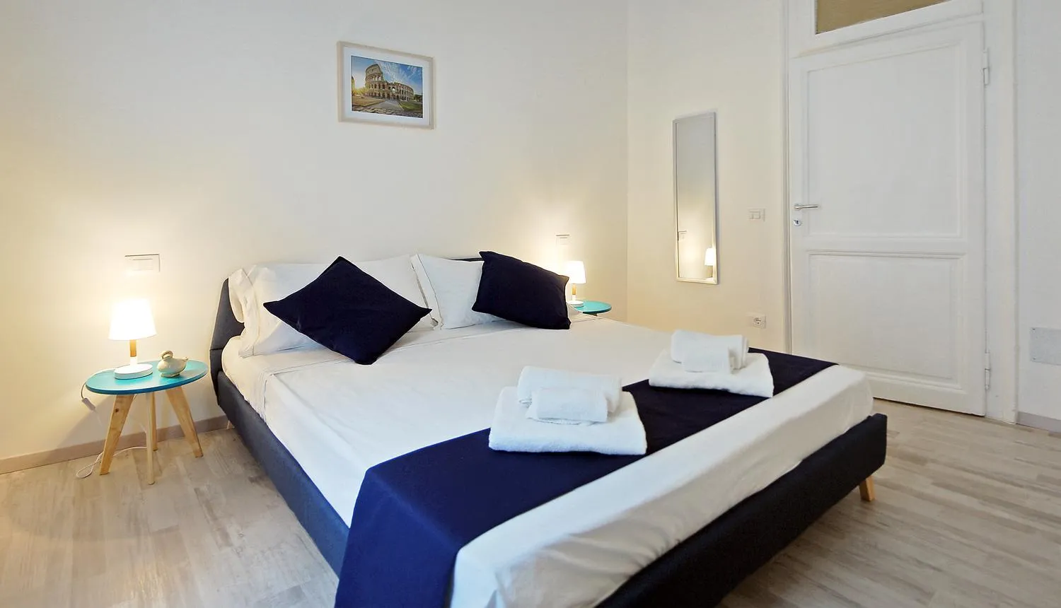 Bed in Pompeo Magno White Luxury Apartment