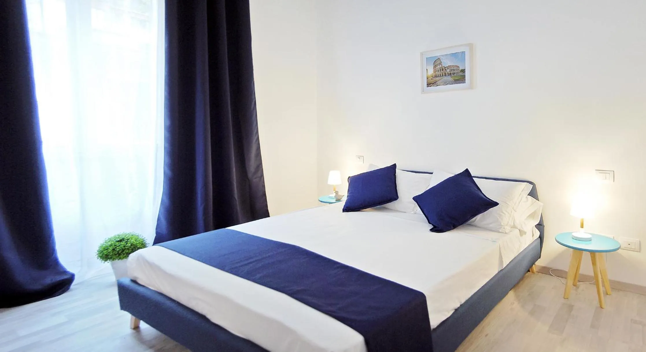 Bed in Pompeo Magno White Luxury Apartment