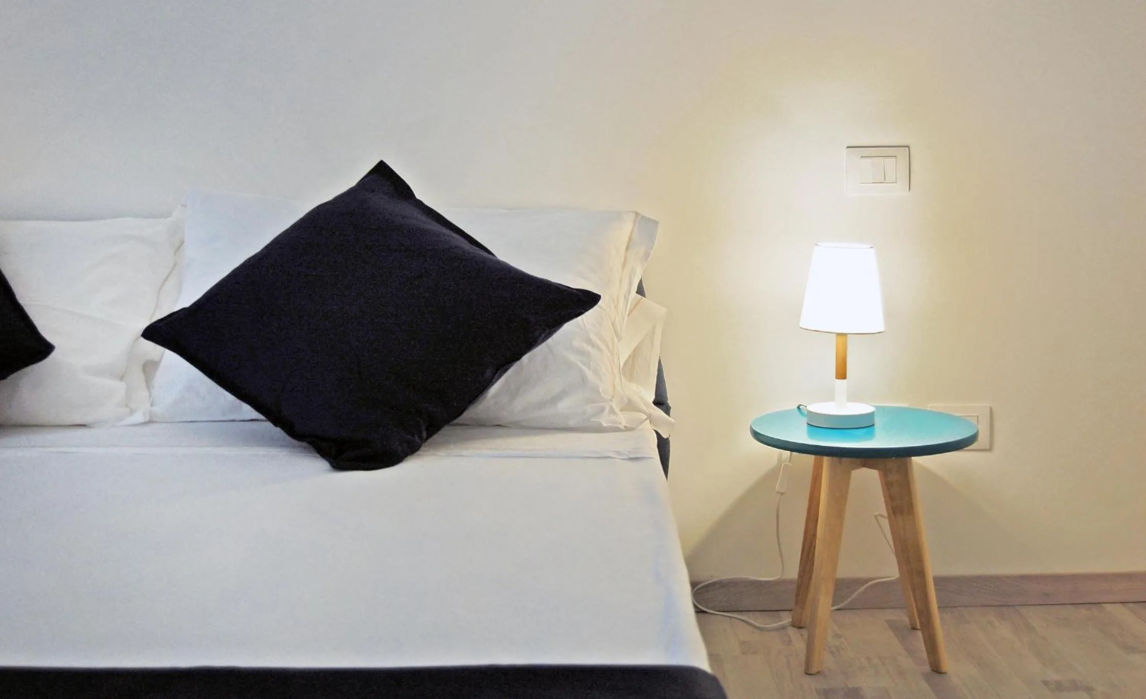 Bed in Pompeo Magno White Luxury Apartment
