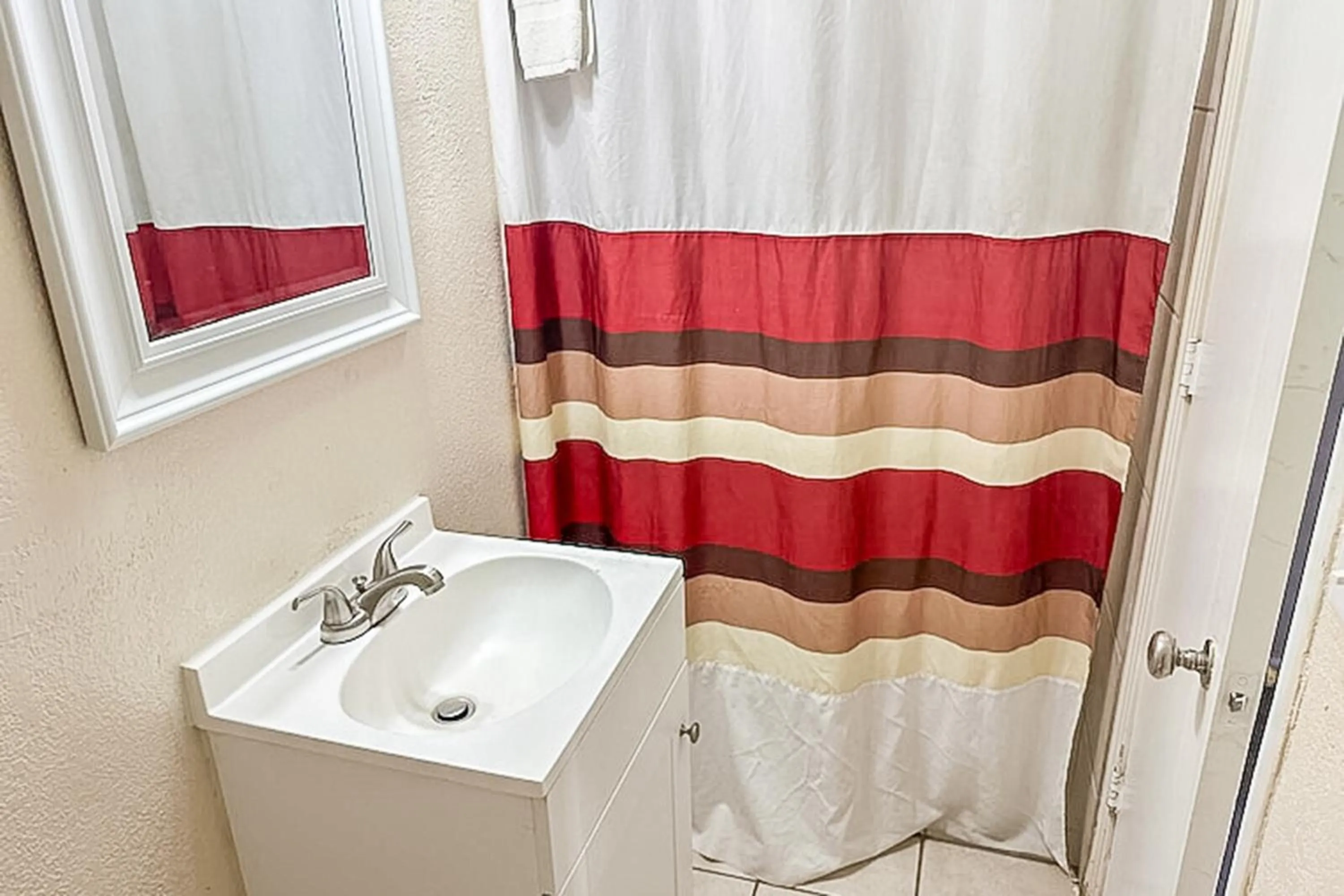 Bathroom in Economy Inn By OYO, Lamesa TX