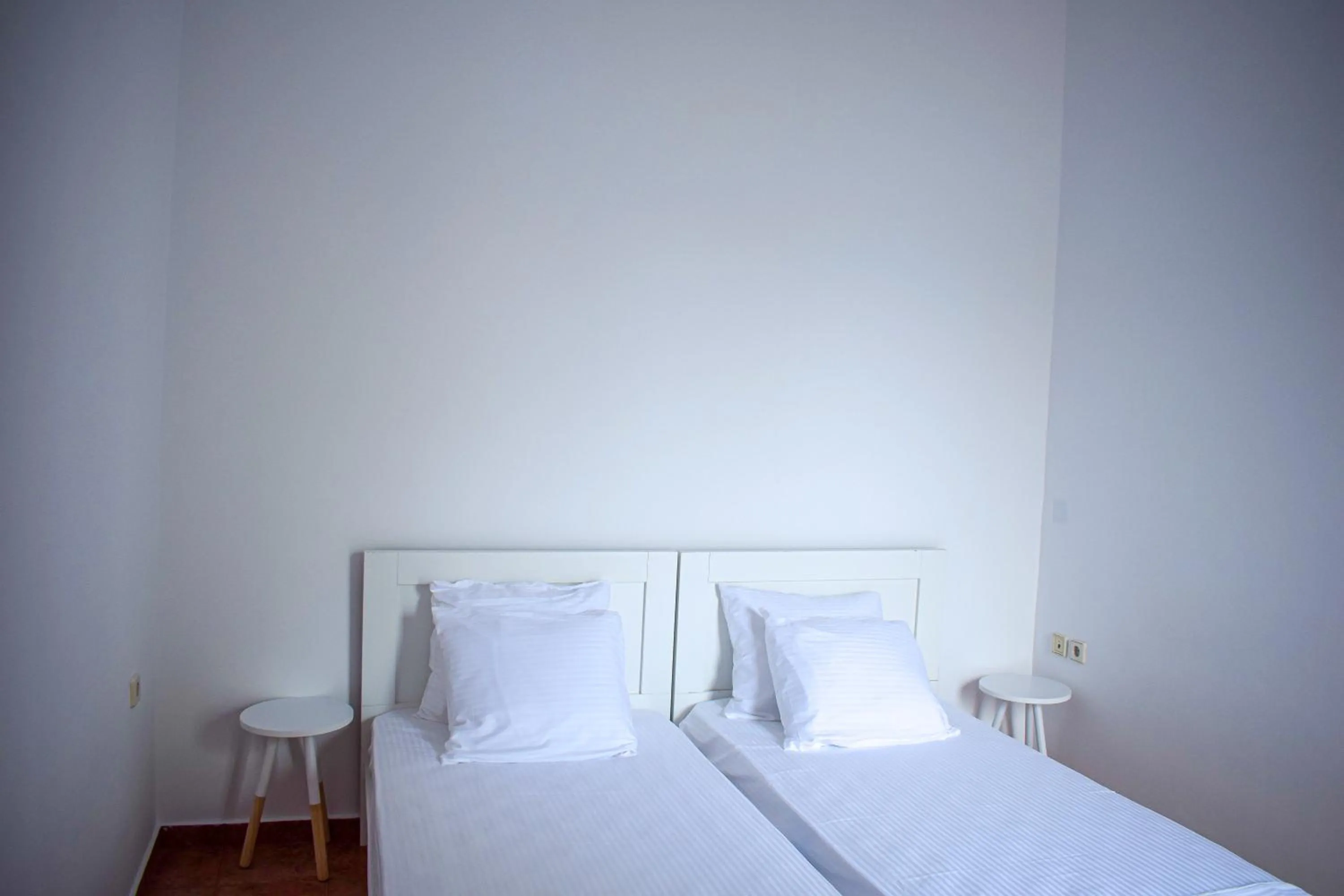 Bed in Muses seaside Villas