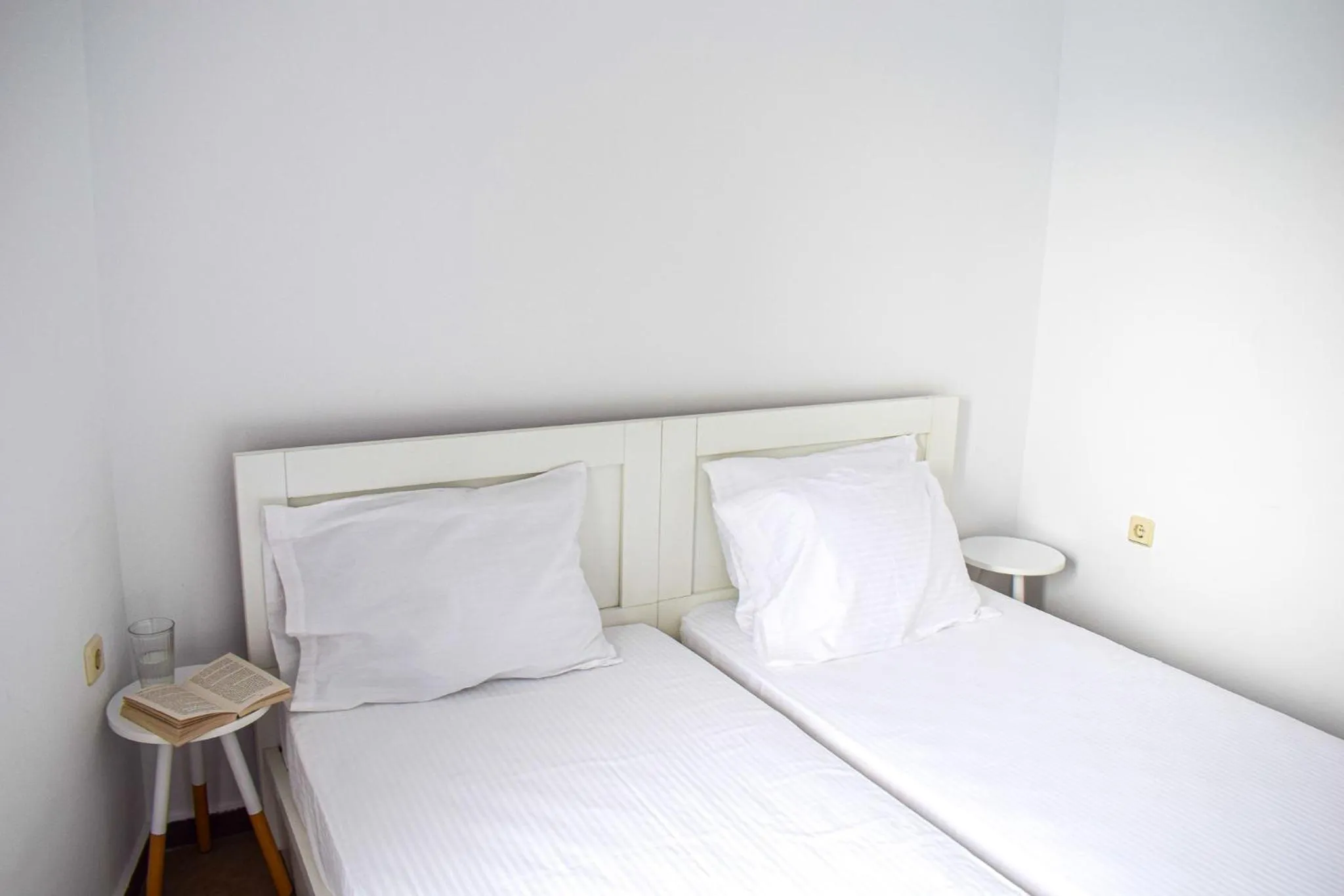 Bed in Muses seaside Villas