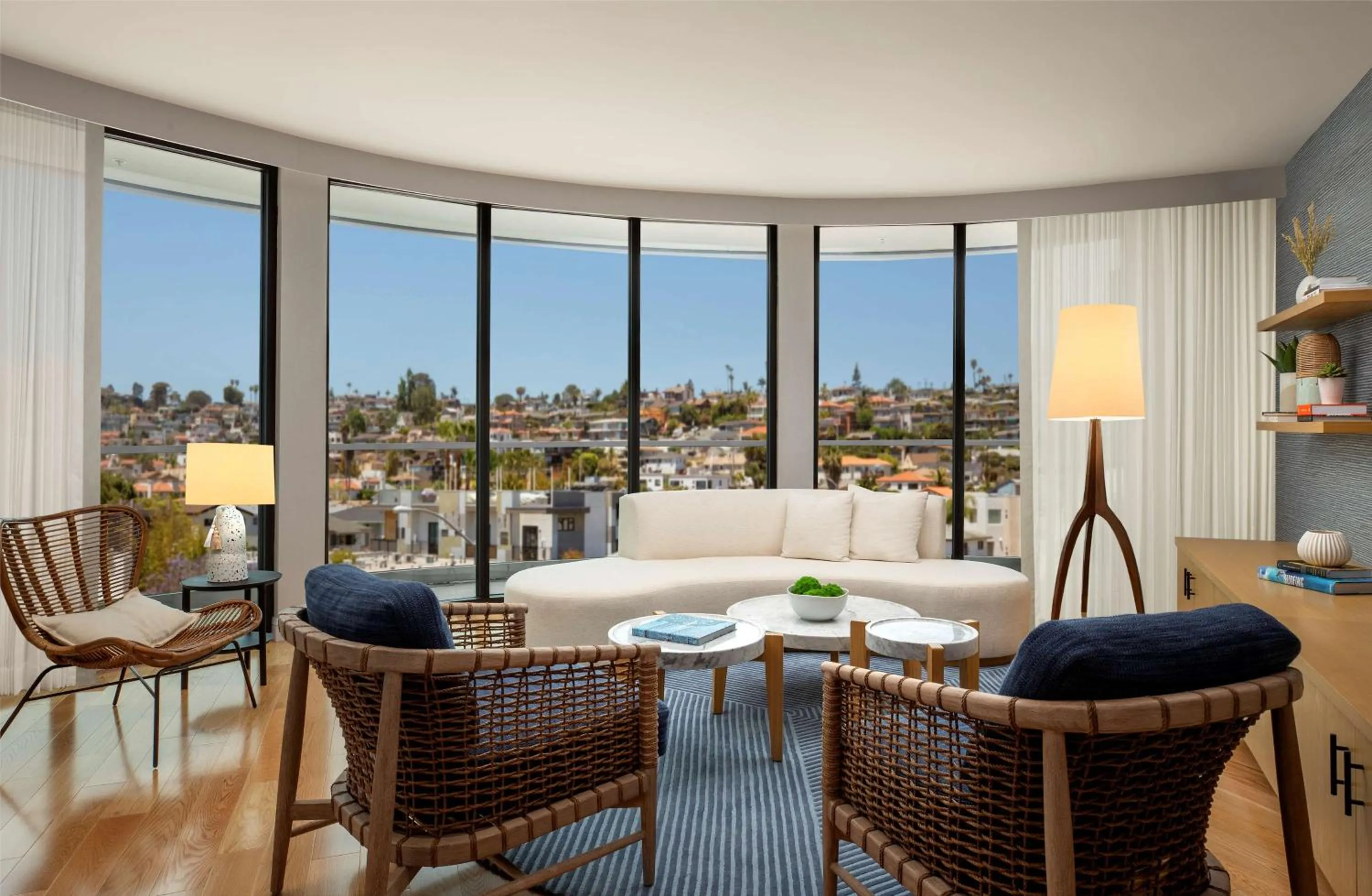 Living room in The Monsaraz San Diego, Tapestry Collection By Hilton