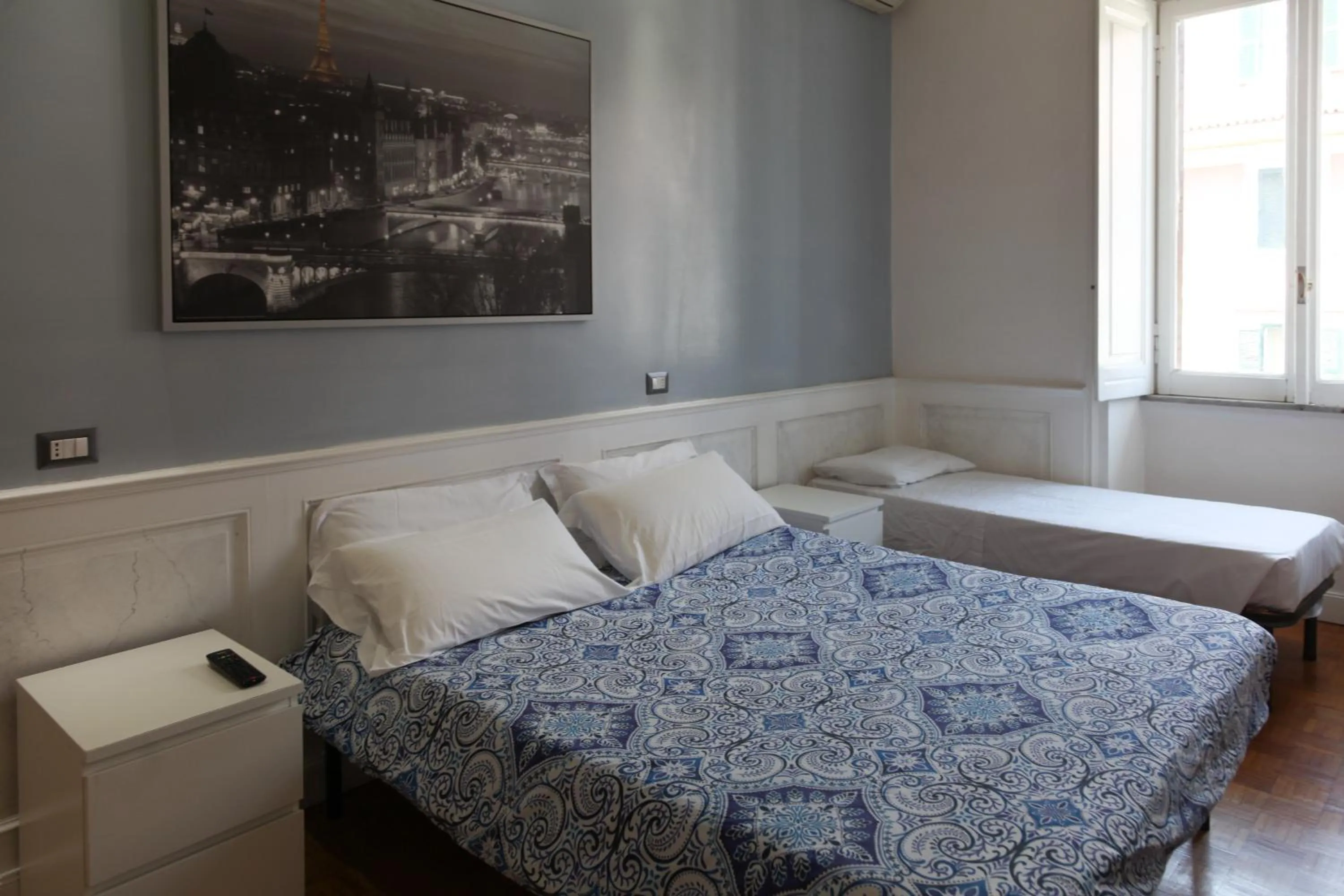 Photo of the whole room, Bed in Vatican Room and Kitchen