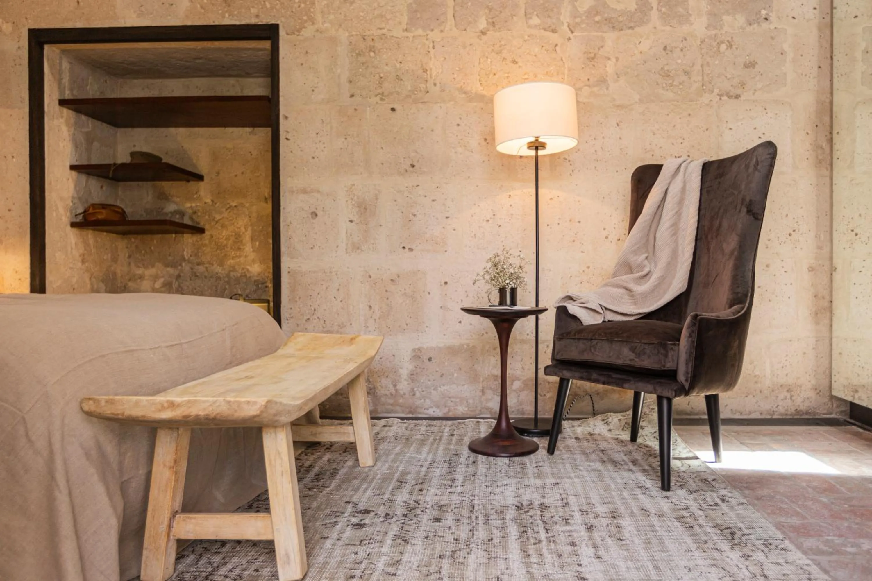 Seating area in CIRQA - Relais & Châteaux