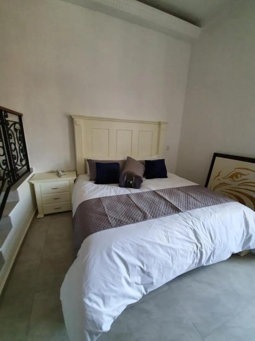 Bed in Hotel Estancia Real