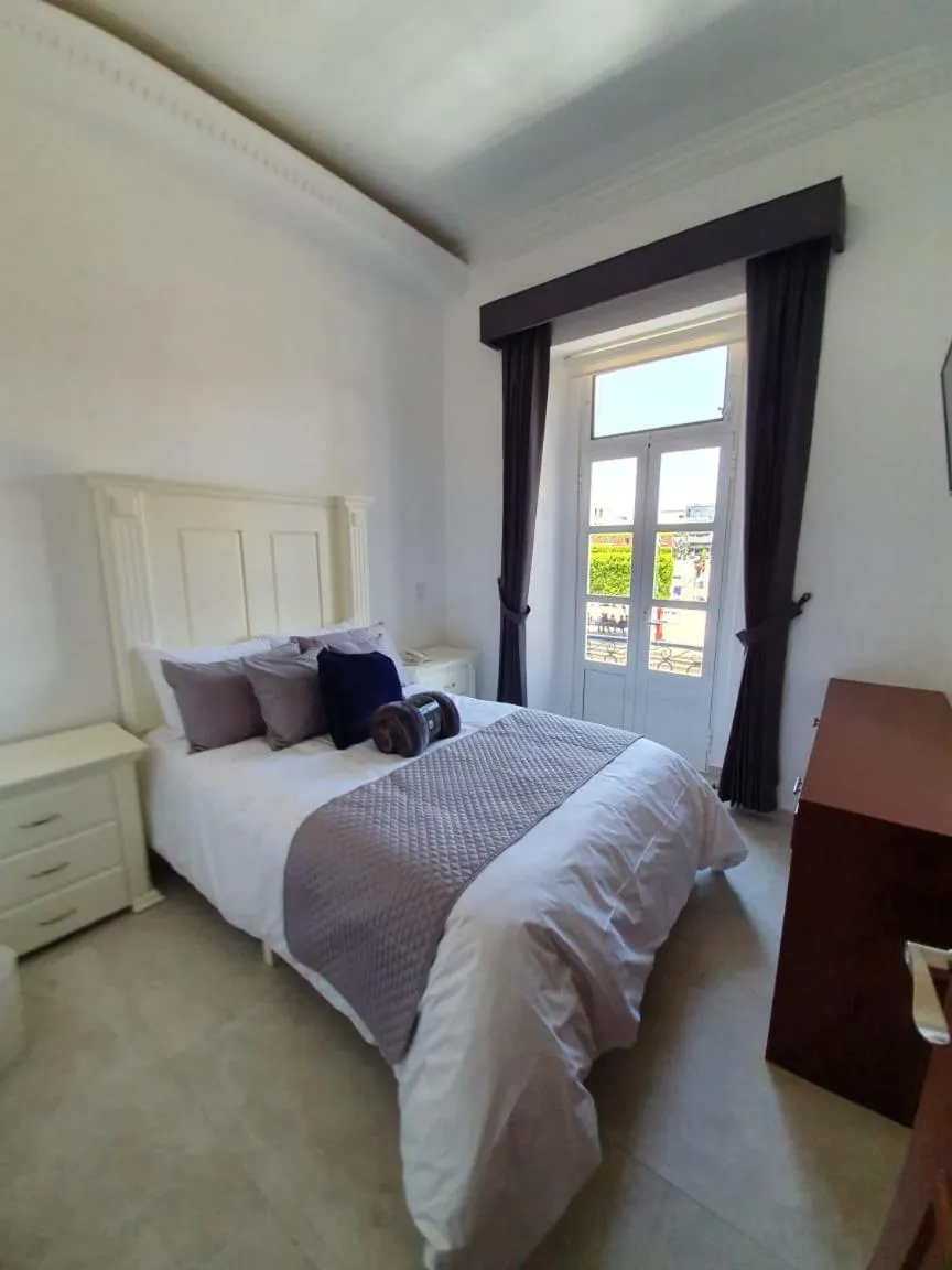 Bed in Hotel Estancia Real