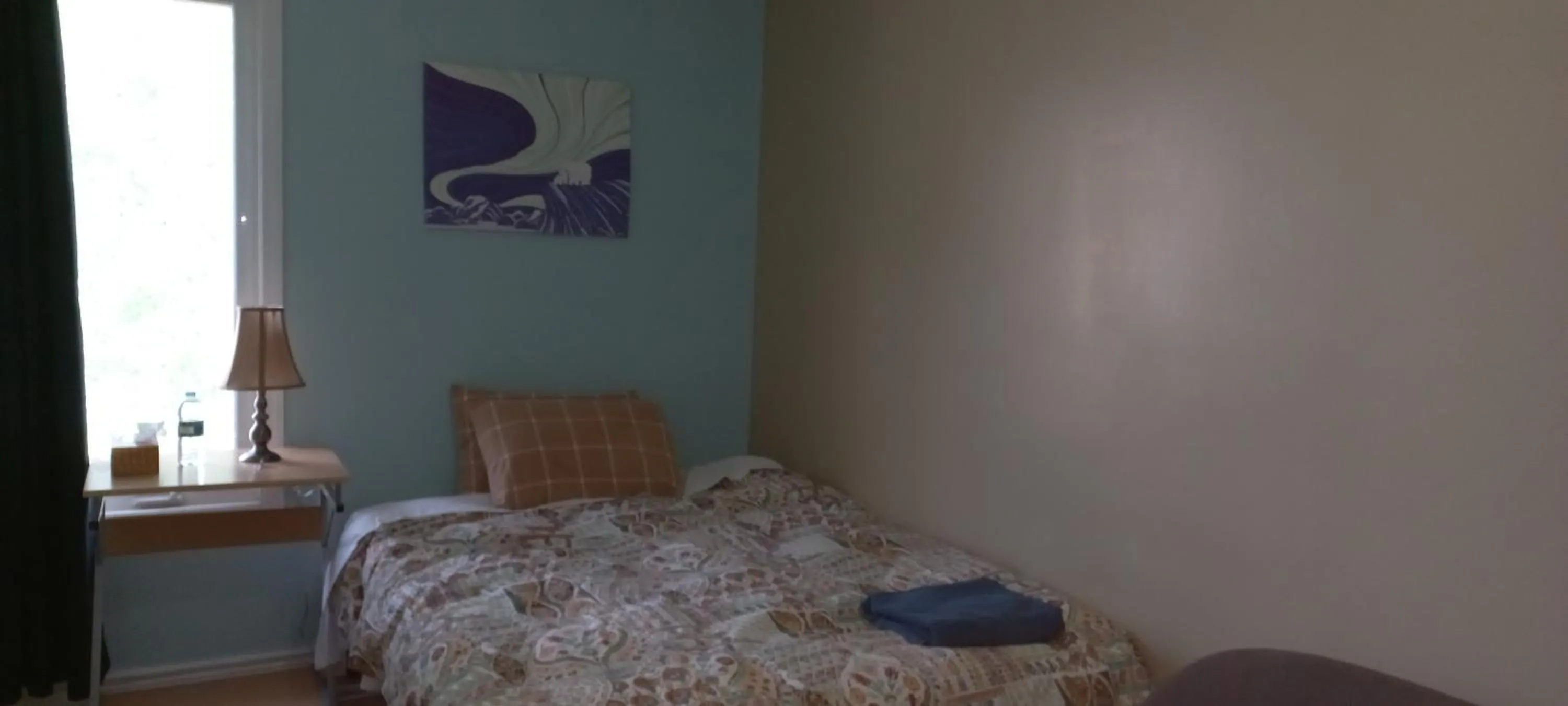 Bed in Jenny Guest House