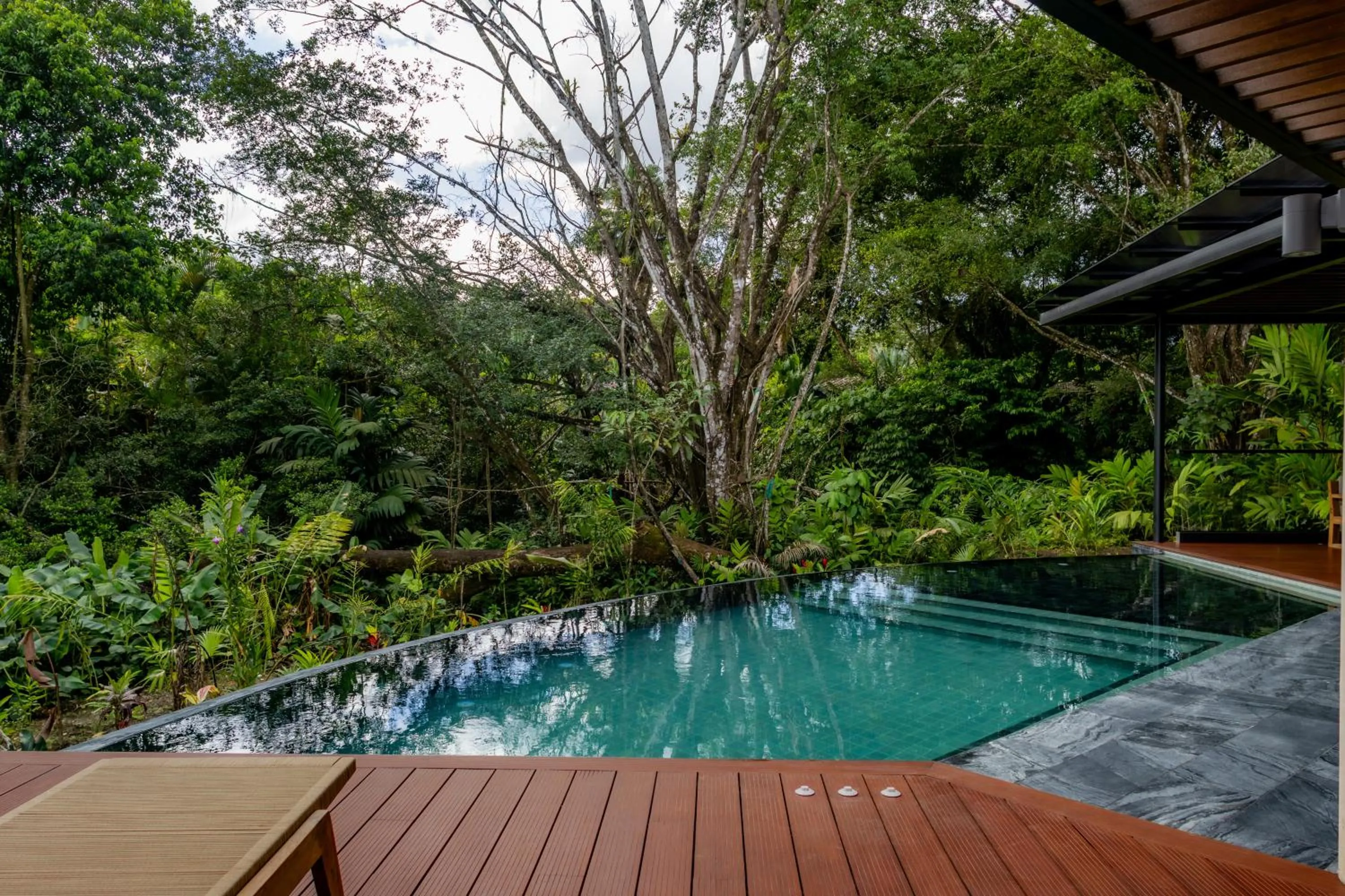 Swimming pool in Noah's Forest Hotel by Tifakara