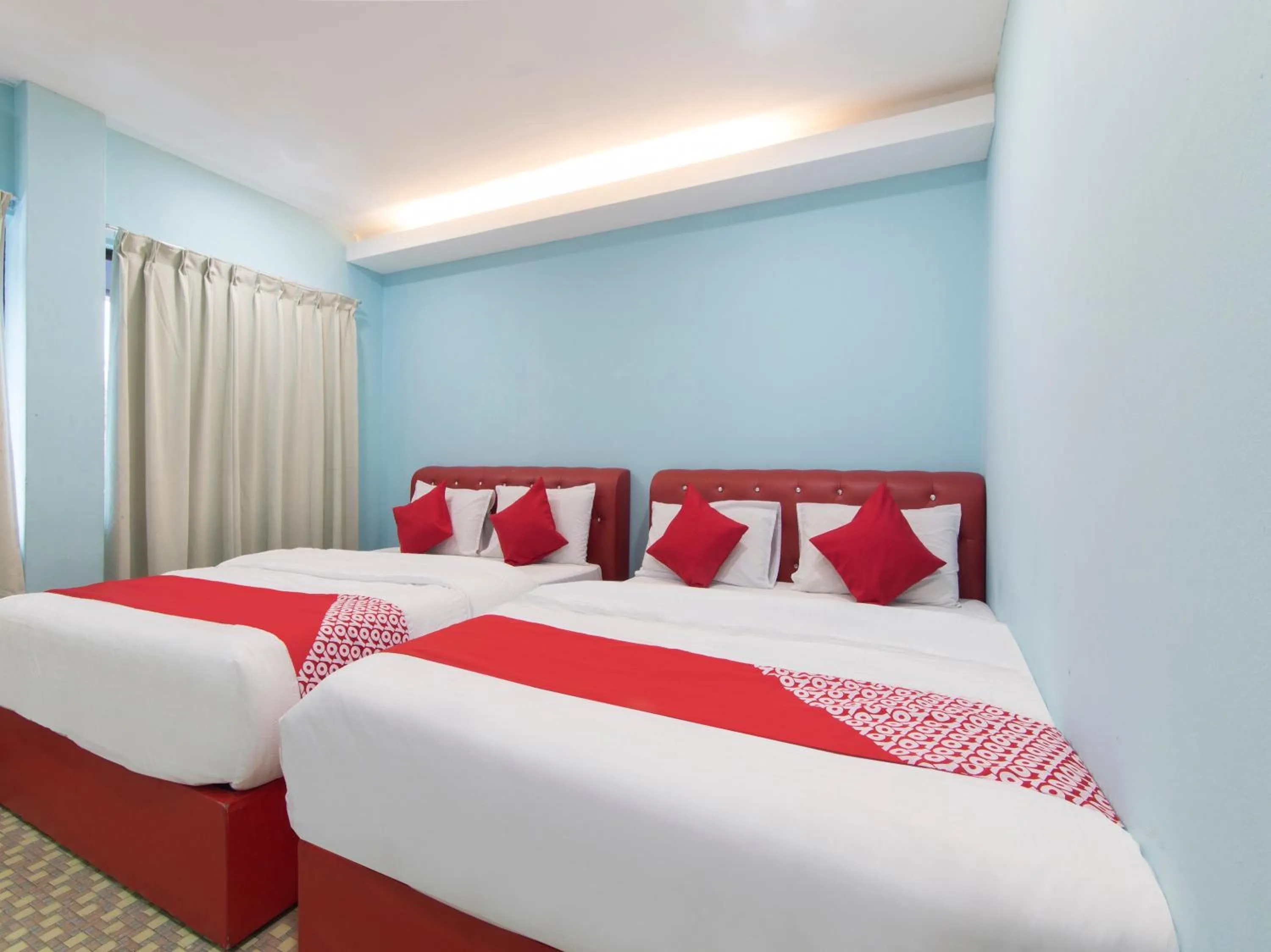 Bedroom in OYO 1136 Pd Star Hotel