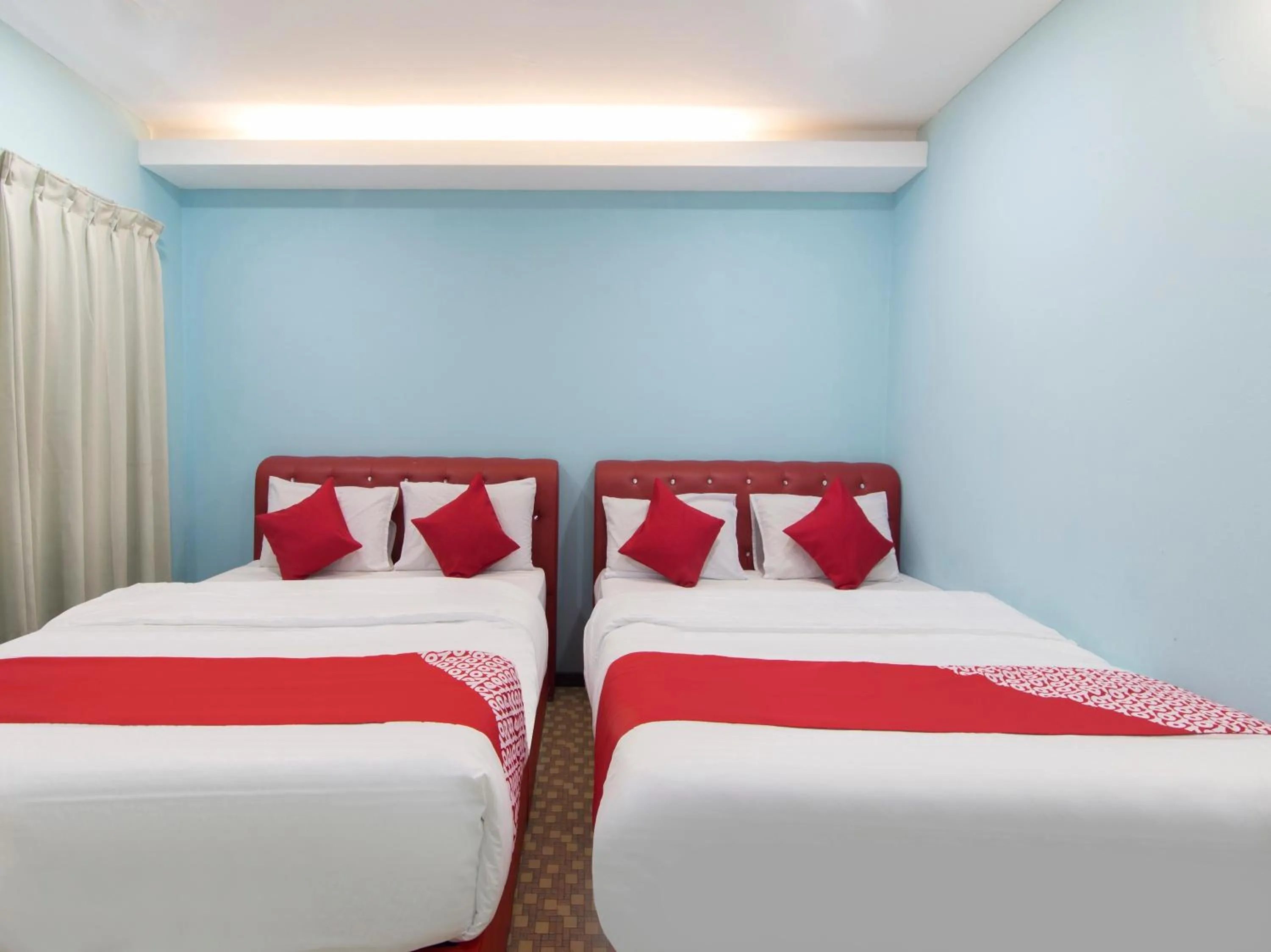 Bedroom in OYO 1136 Pd Star Hotel