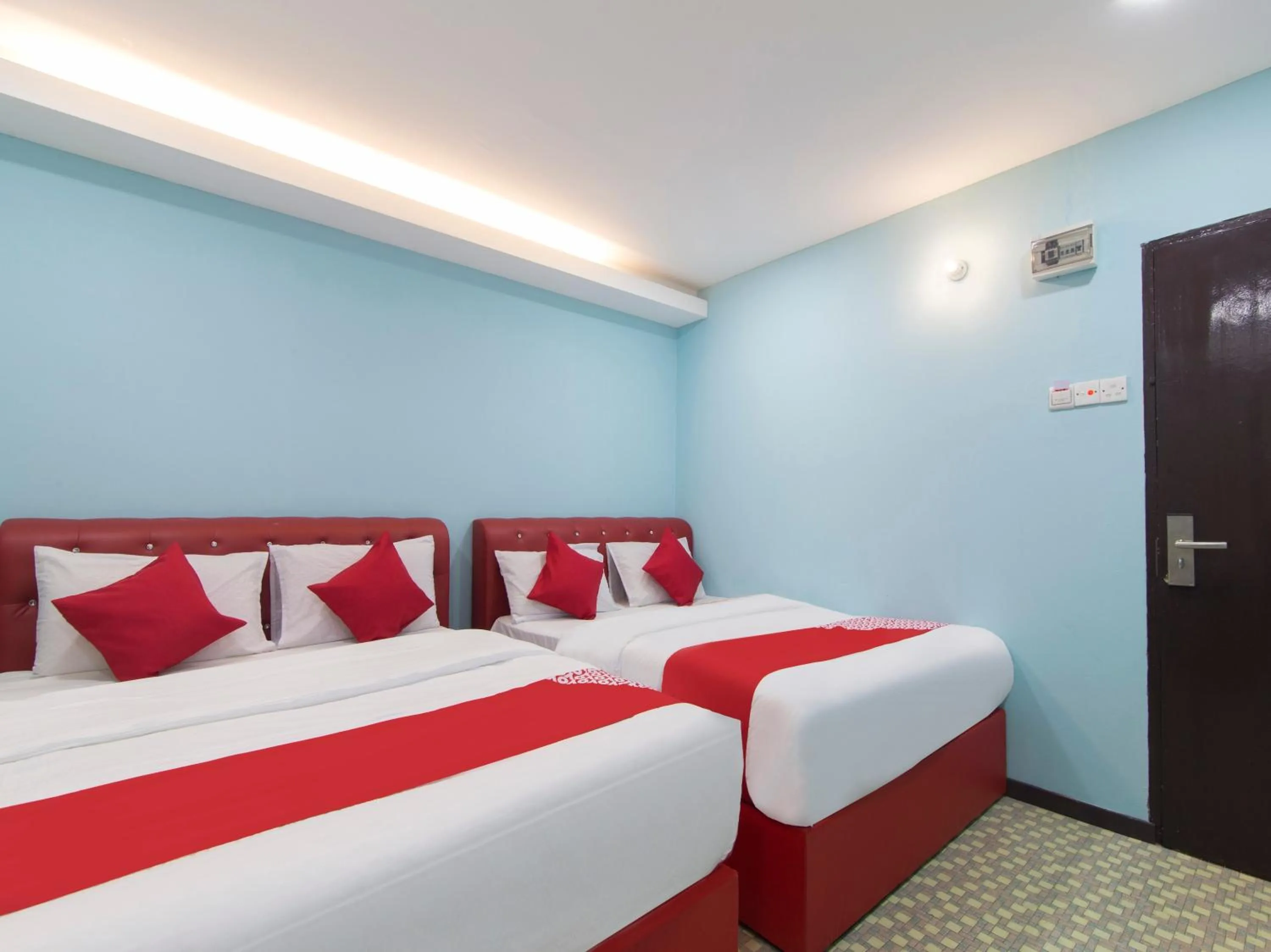 Bedroom in OYO 1136 Pd Star Hotel