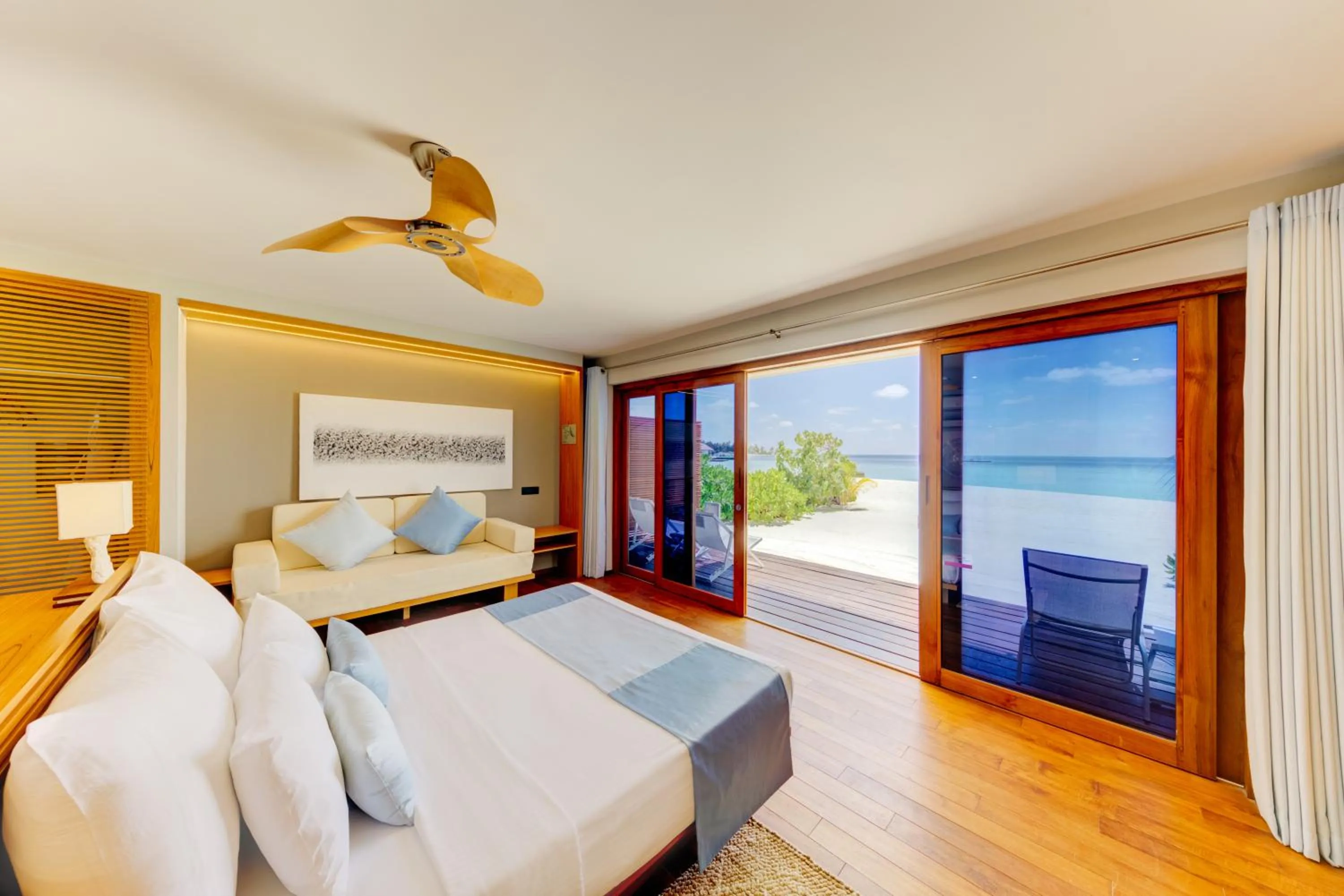 Photo of the whole room, Bed in Cinnamon Velifushi Maldives
