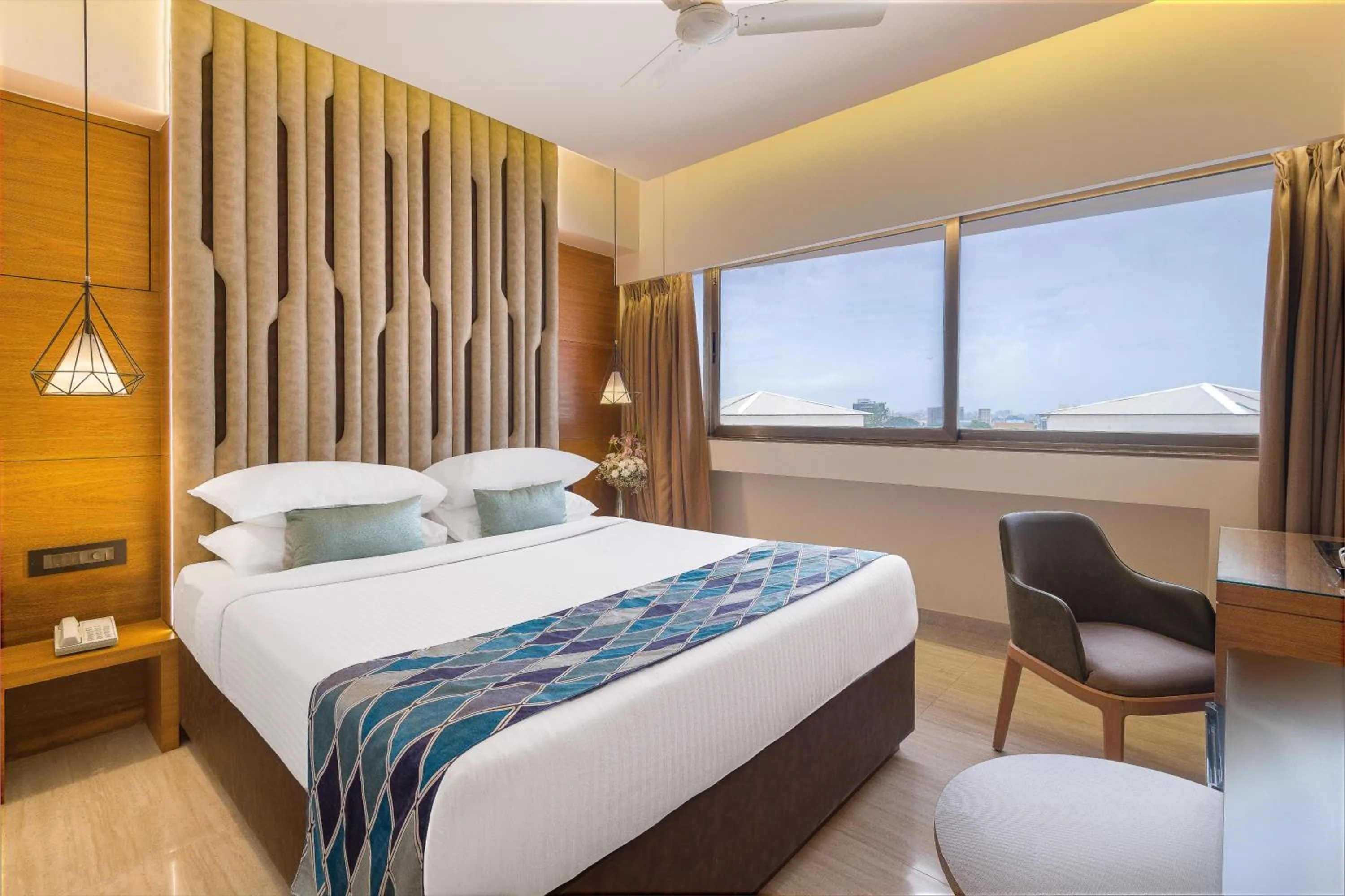 Bed in Hotel Metropole Inn