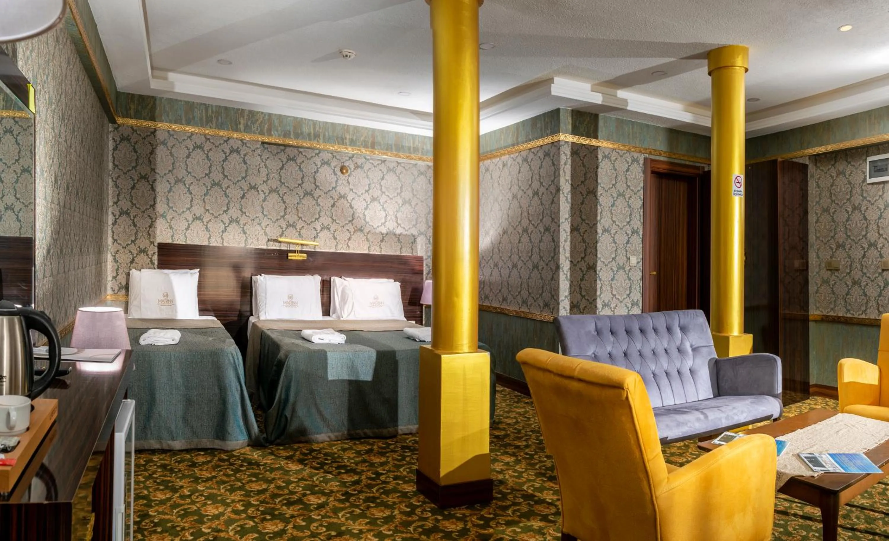 Bed in MARINN DELUXE HOTEL