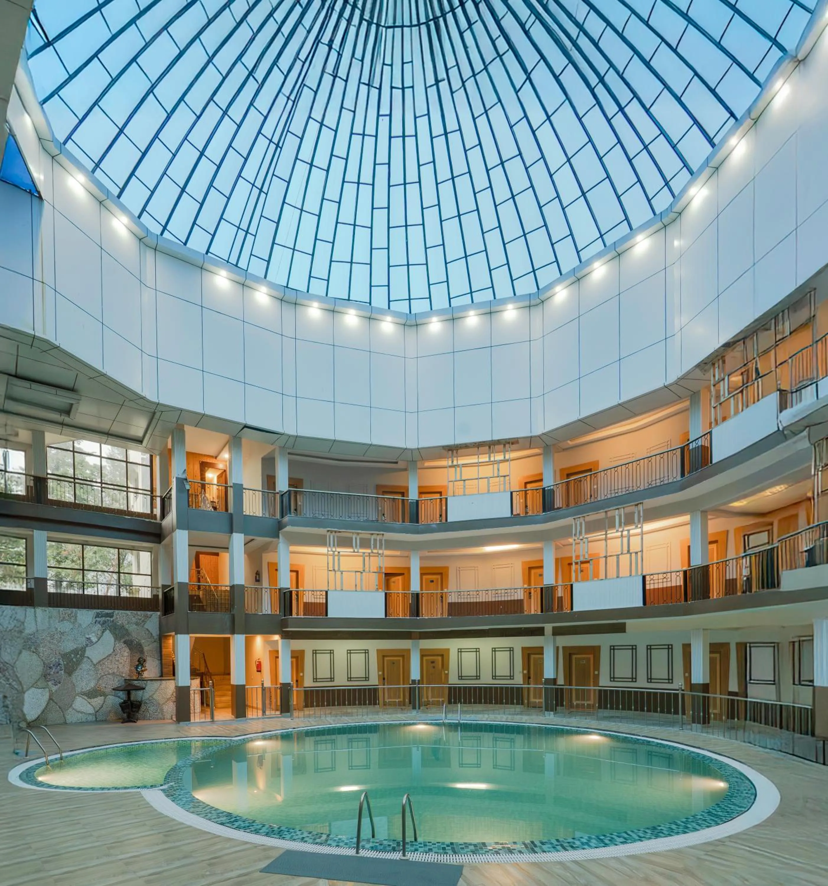 Swimming pool in Excel Hotels and Resorts Bhimtal