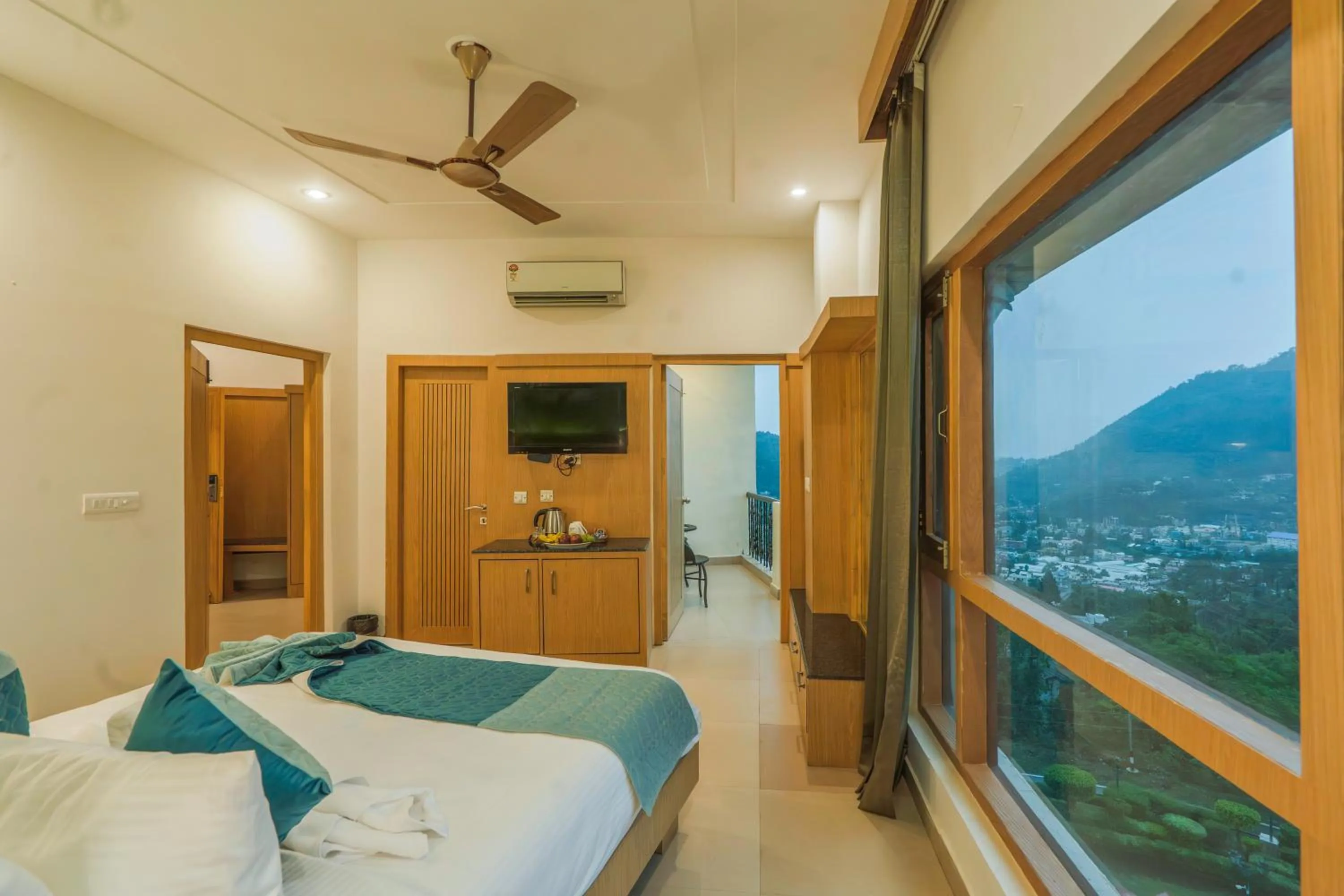 View (from property/room), Bed in Excel Hotels and Resorts Bhimtal