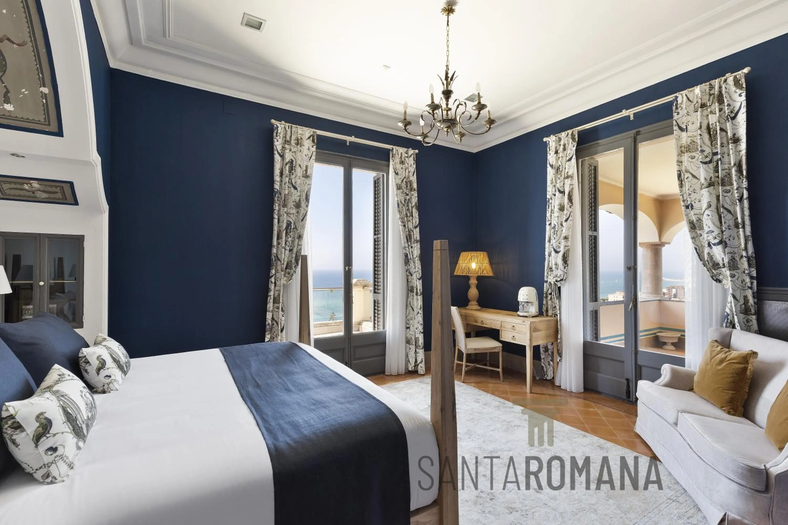 Bed in Santa Romana Apartments & Suites