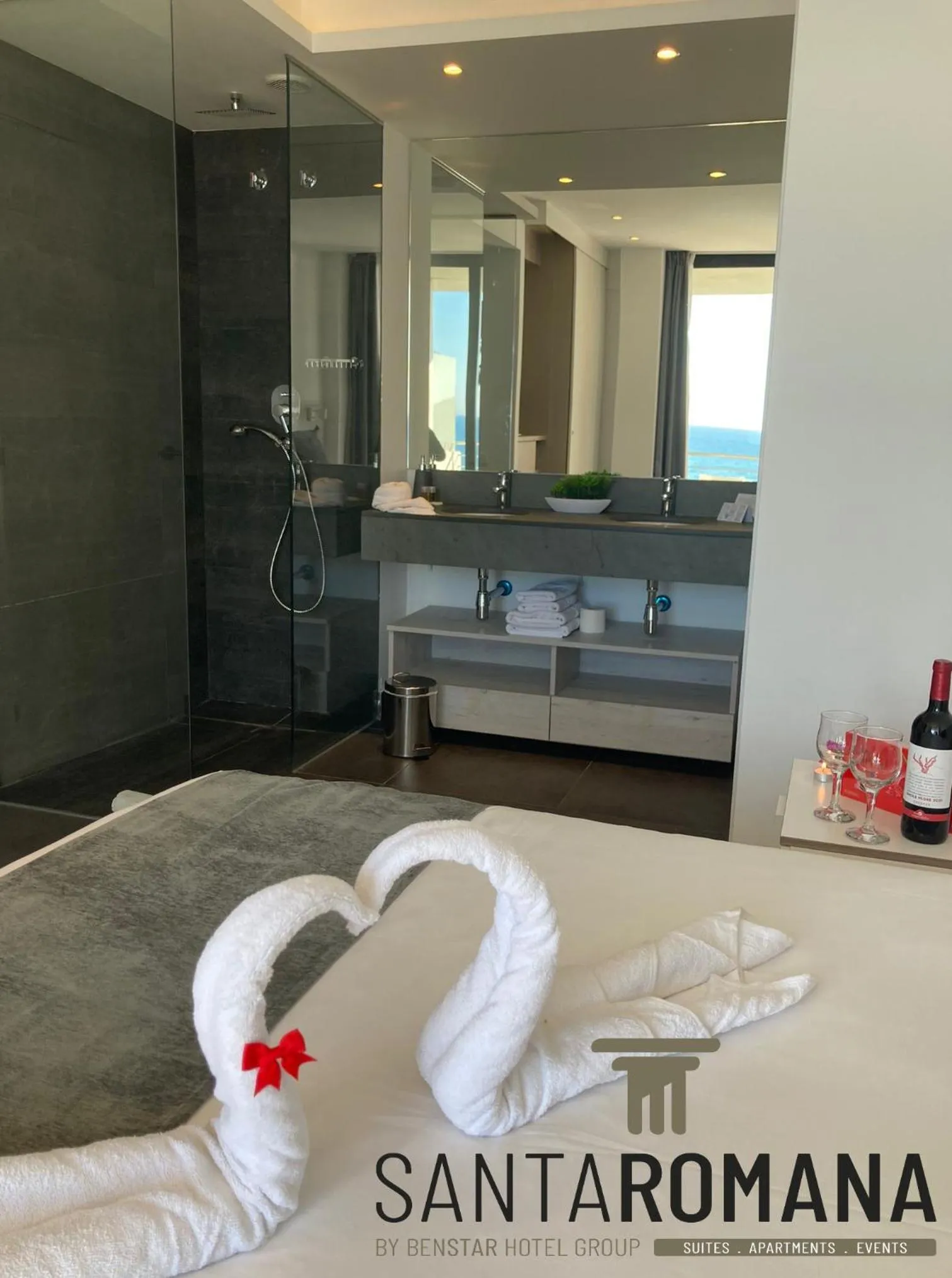 Bed in Santa Romana Apartments & Suites