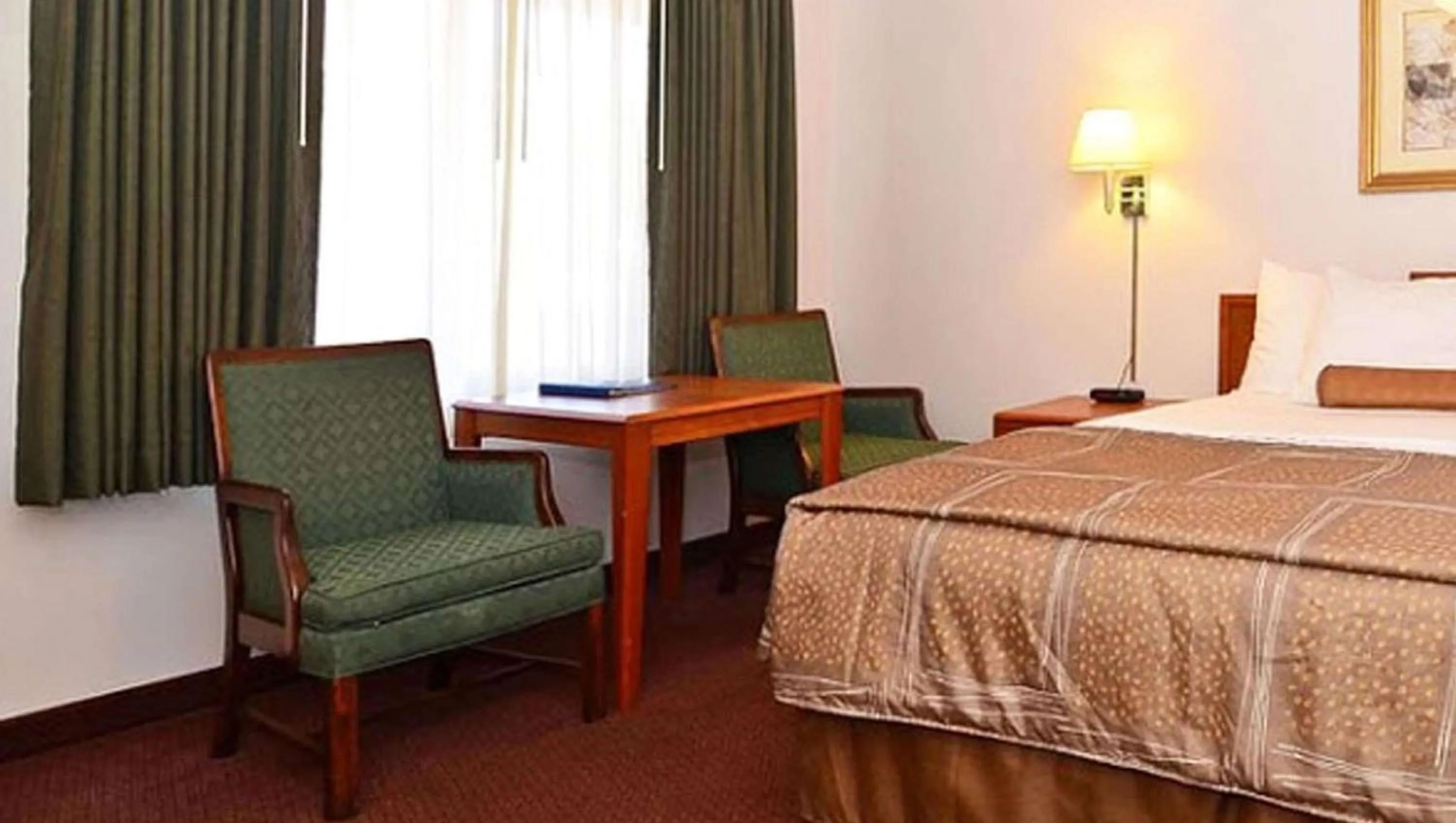 Photo of the whole room, Bed in Magnuson Hotel Manitou Springs