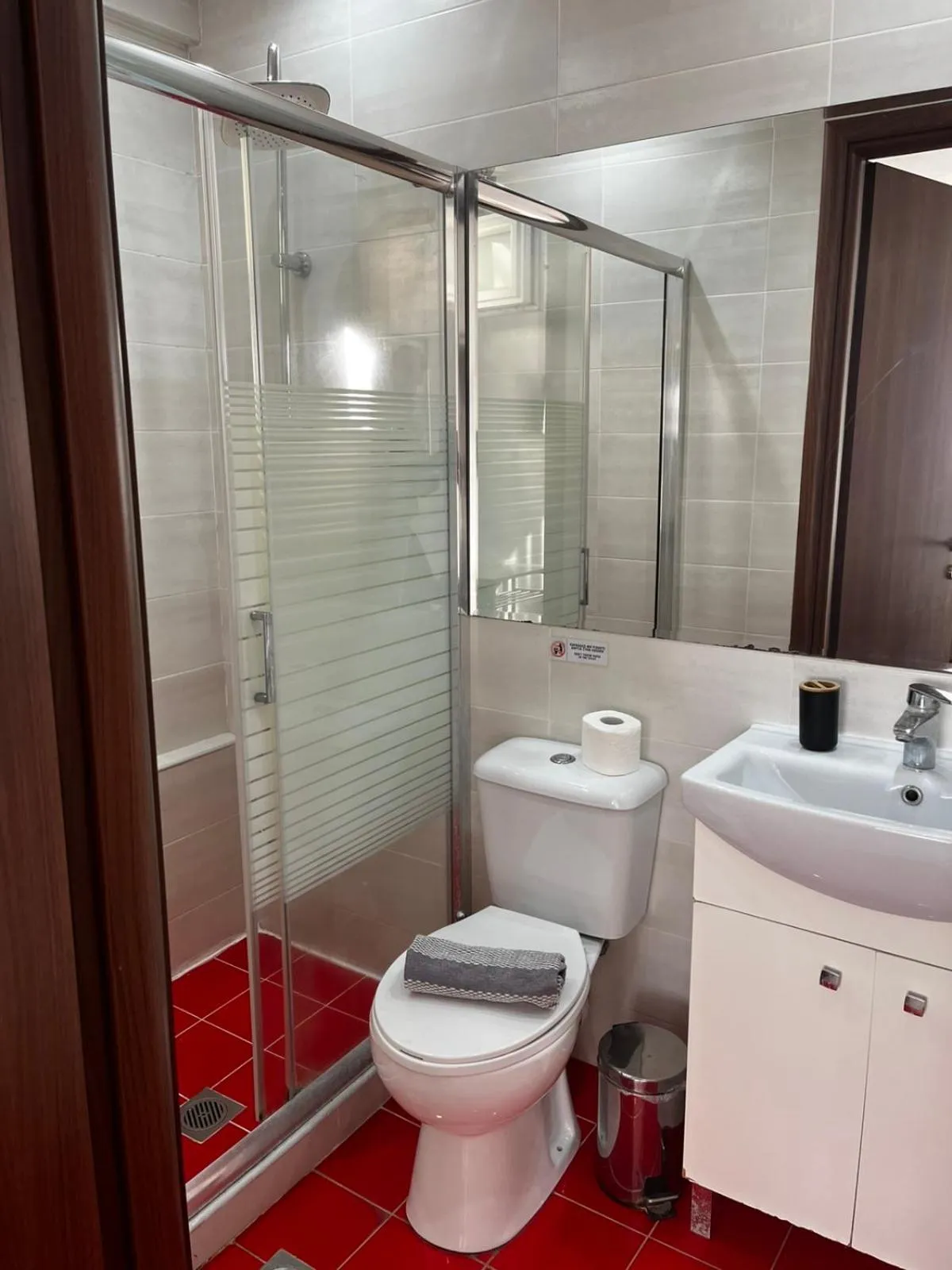 Toilet in City Plaza Apartments & Rooms