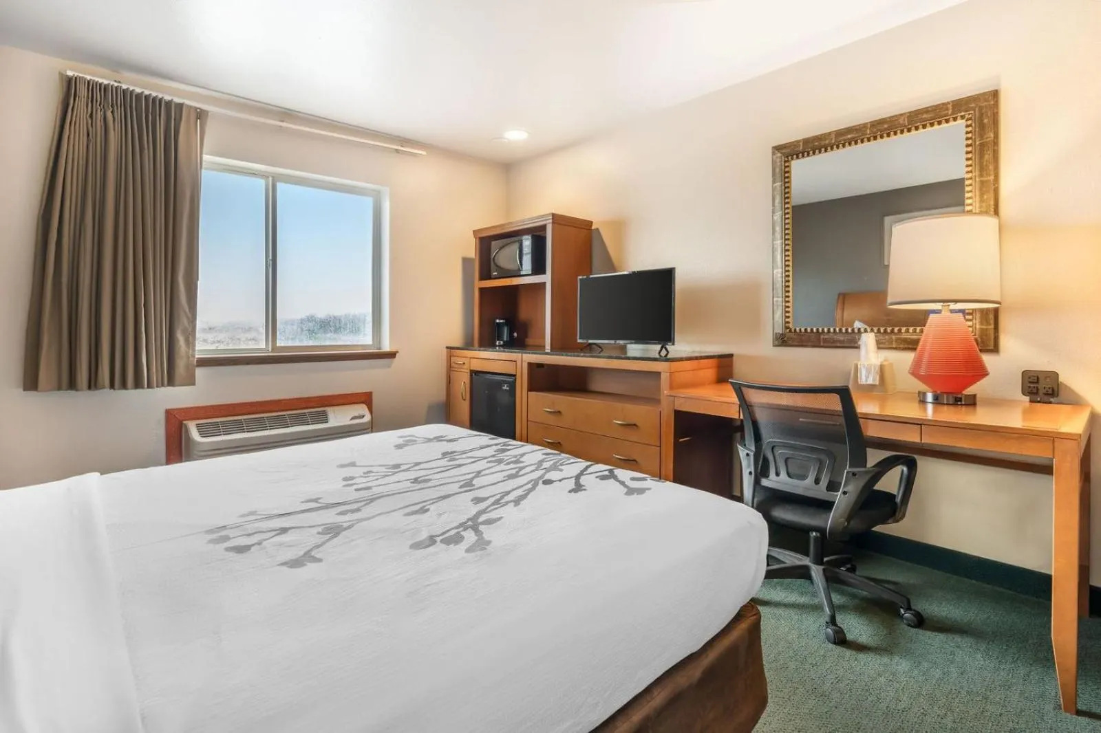 Bed in Colstrip Inn & Suites