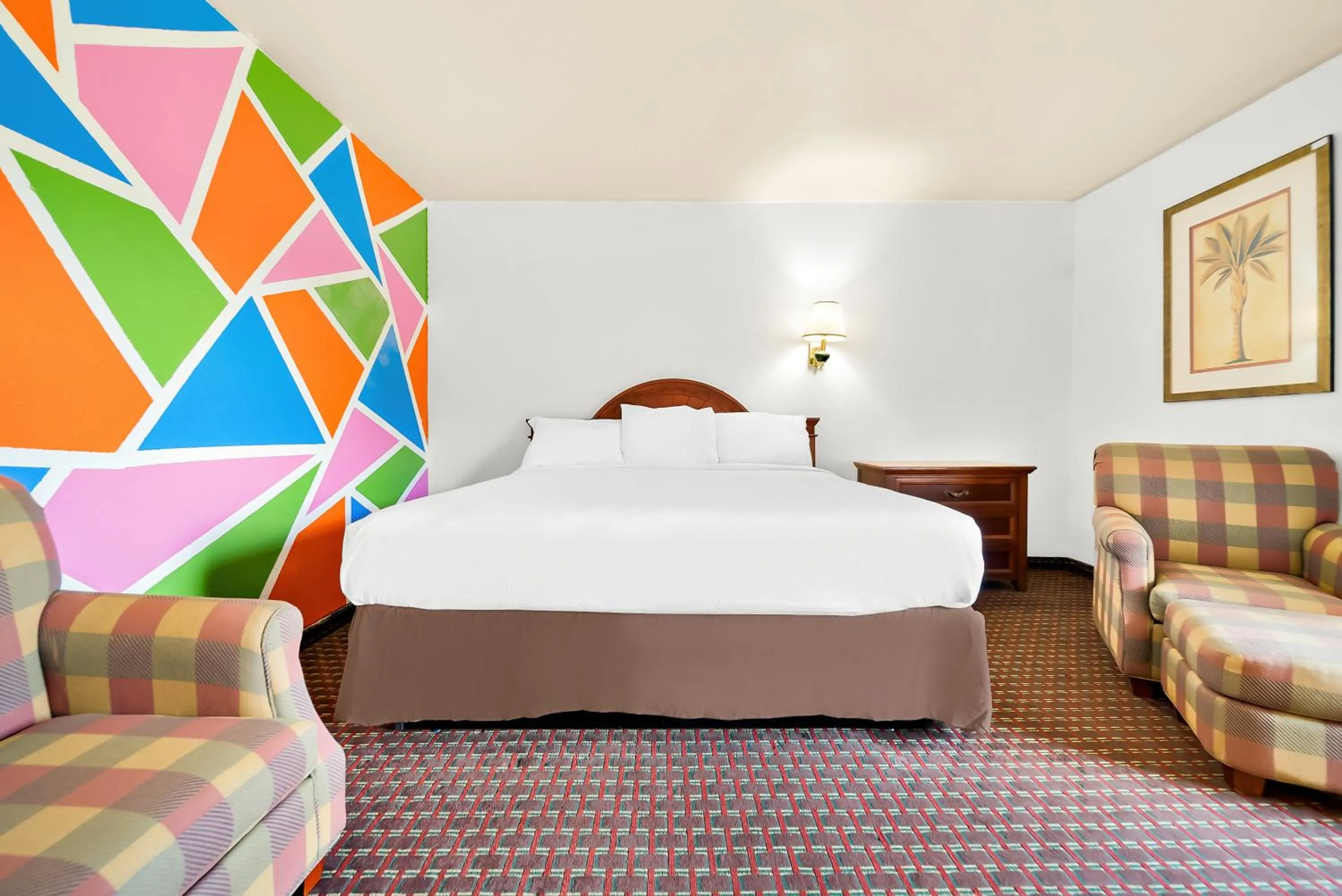 Photo of the whole room, Bed in Capitol Inn and Suites