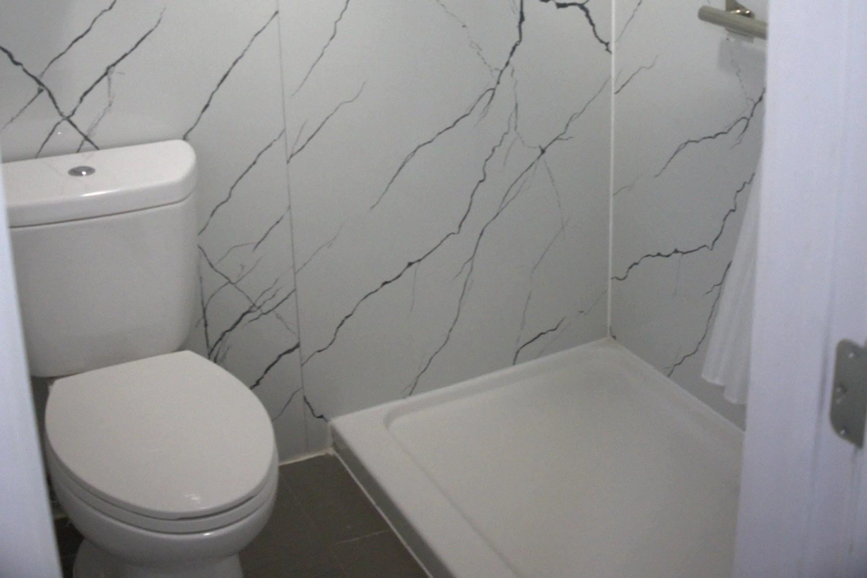 Bedroom in Rodeway Inn