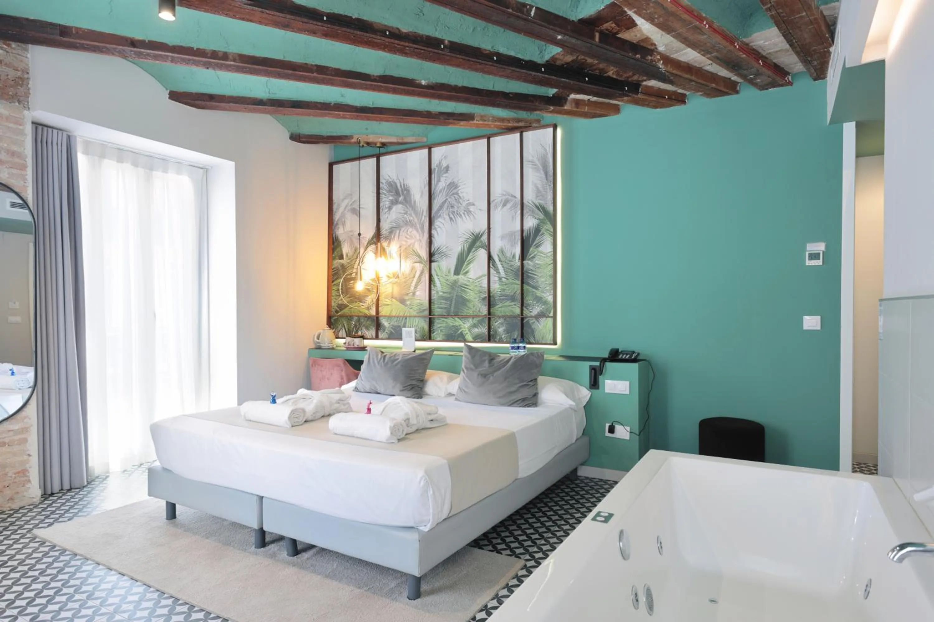 Bed in YOU & CO. Quart Boutique