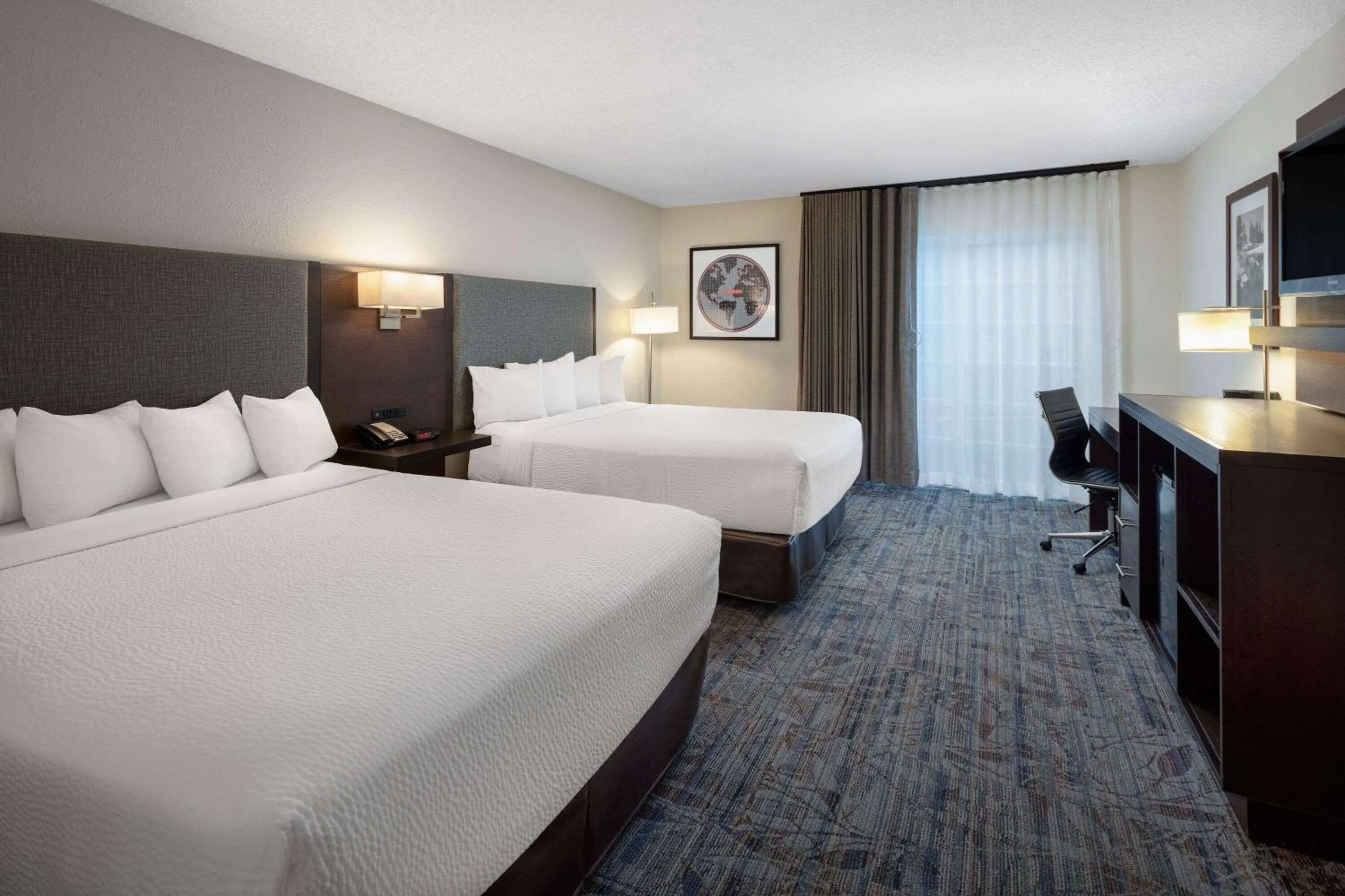Photo of the whole room, Bed in Ramada by Wyndham Spokane Airport