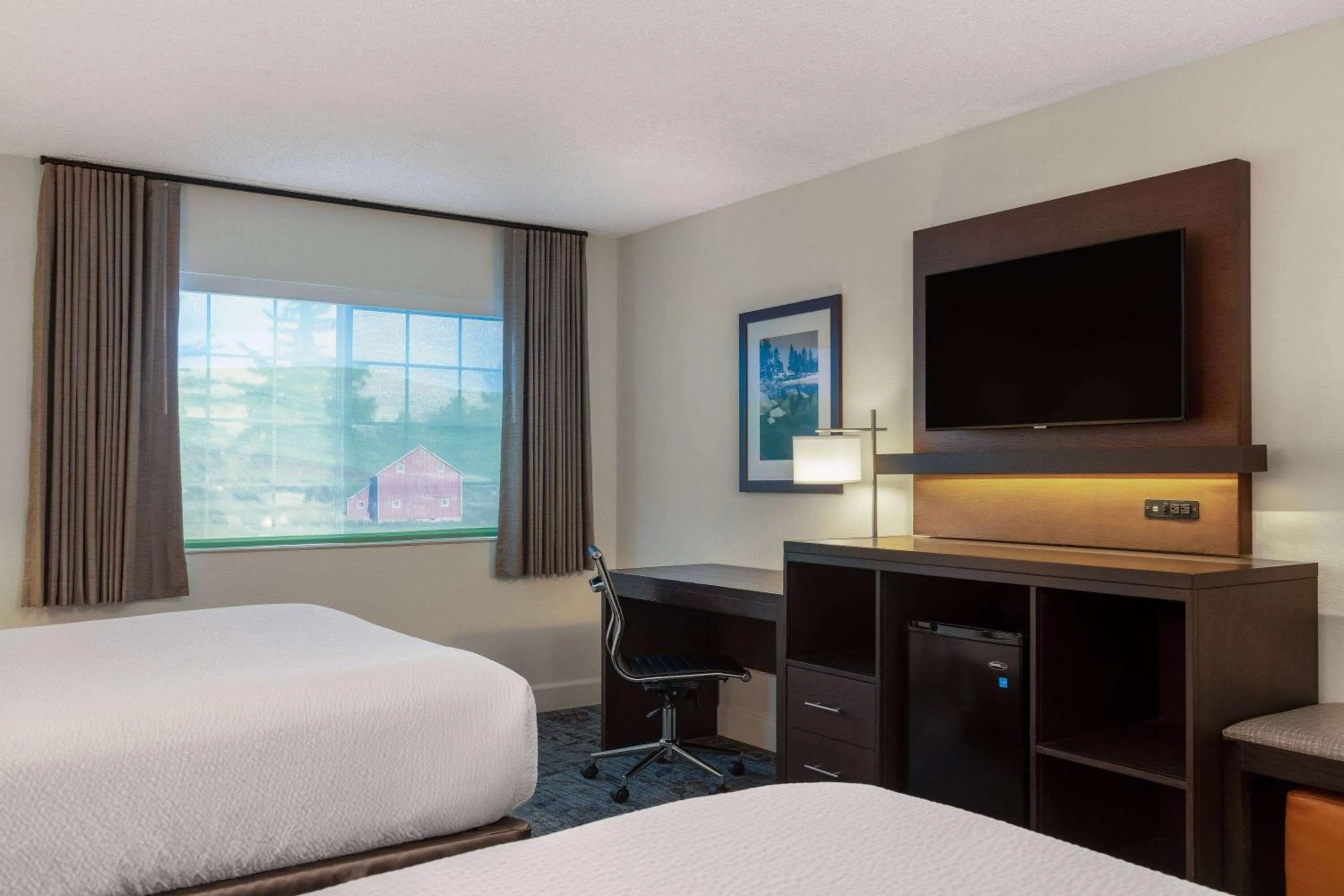 Photo of the whole room, Bed in Ramada by Wyndham Spokane Airport