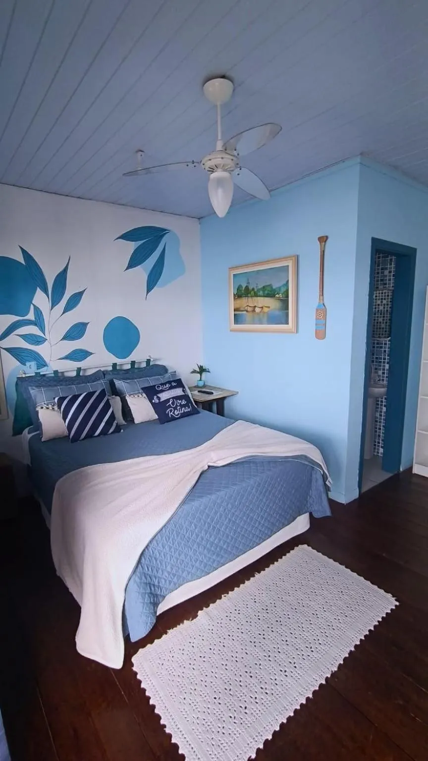 Bed in Pousada Vida Simples