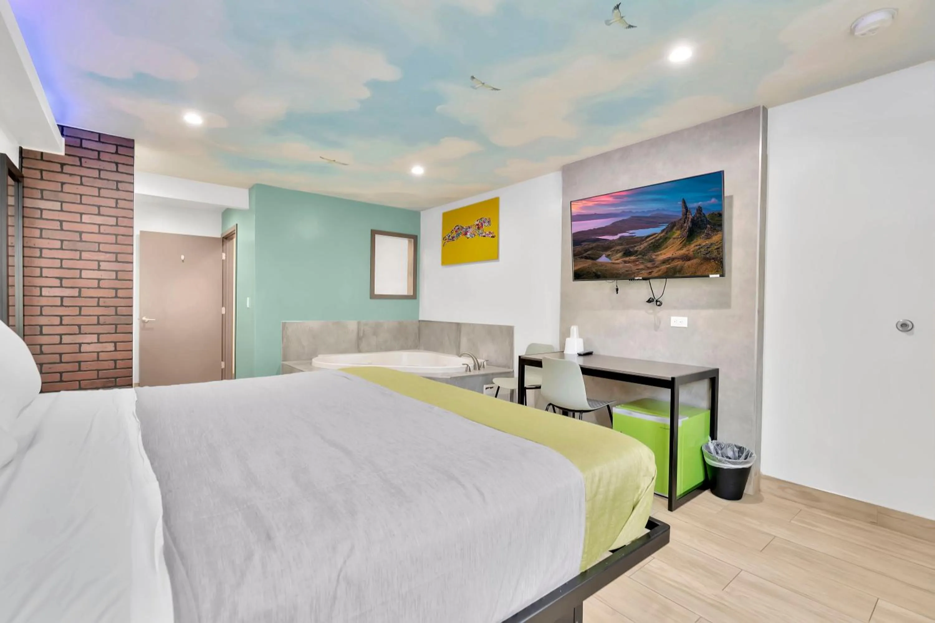 Bed in Exclusivo Inn and Suites