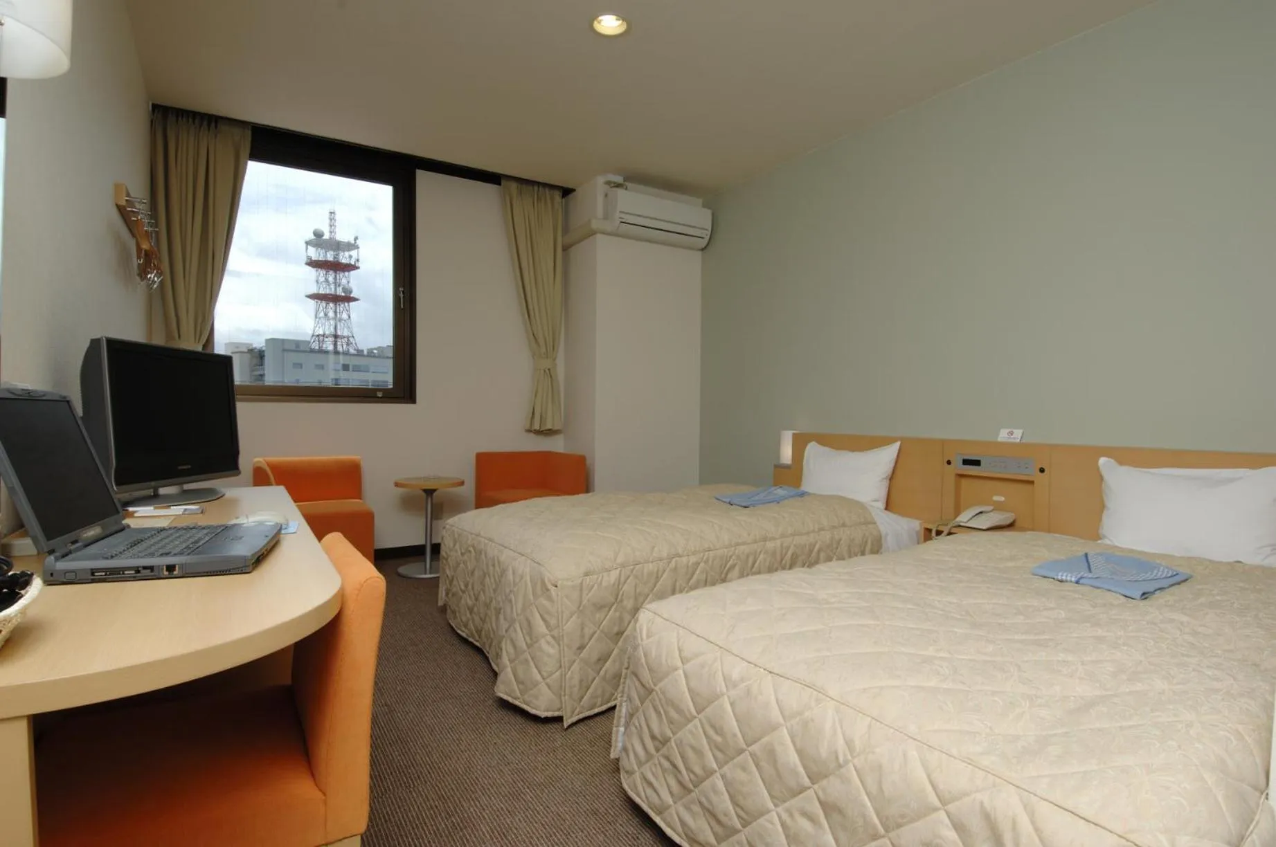 Bed in Hamada New Castle Hotel