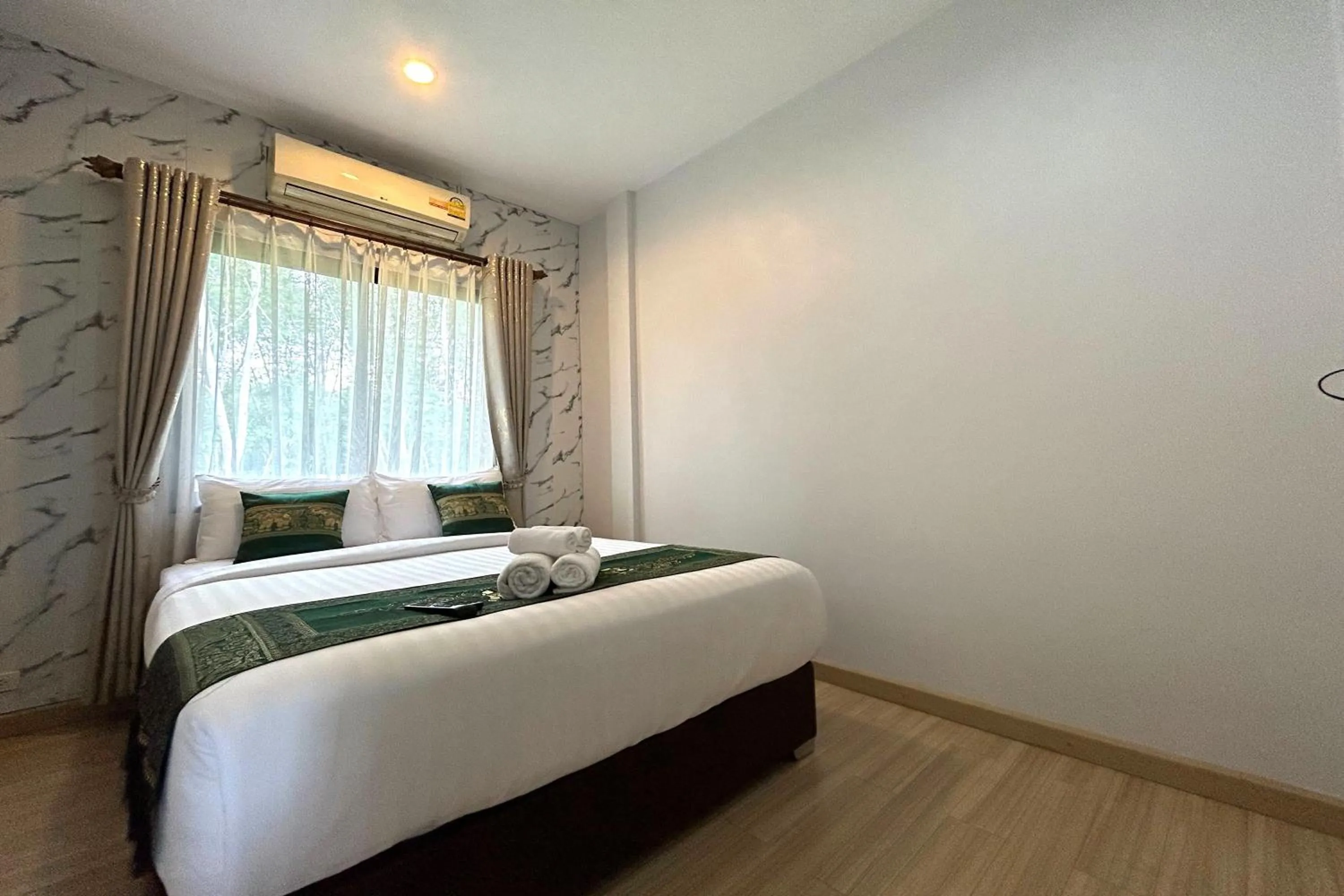 Bed in Nice Villa Resort Hat Yai