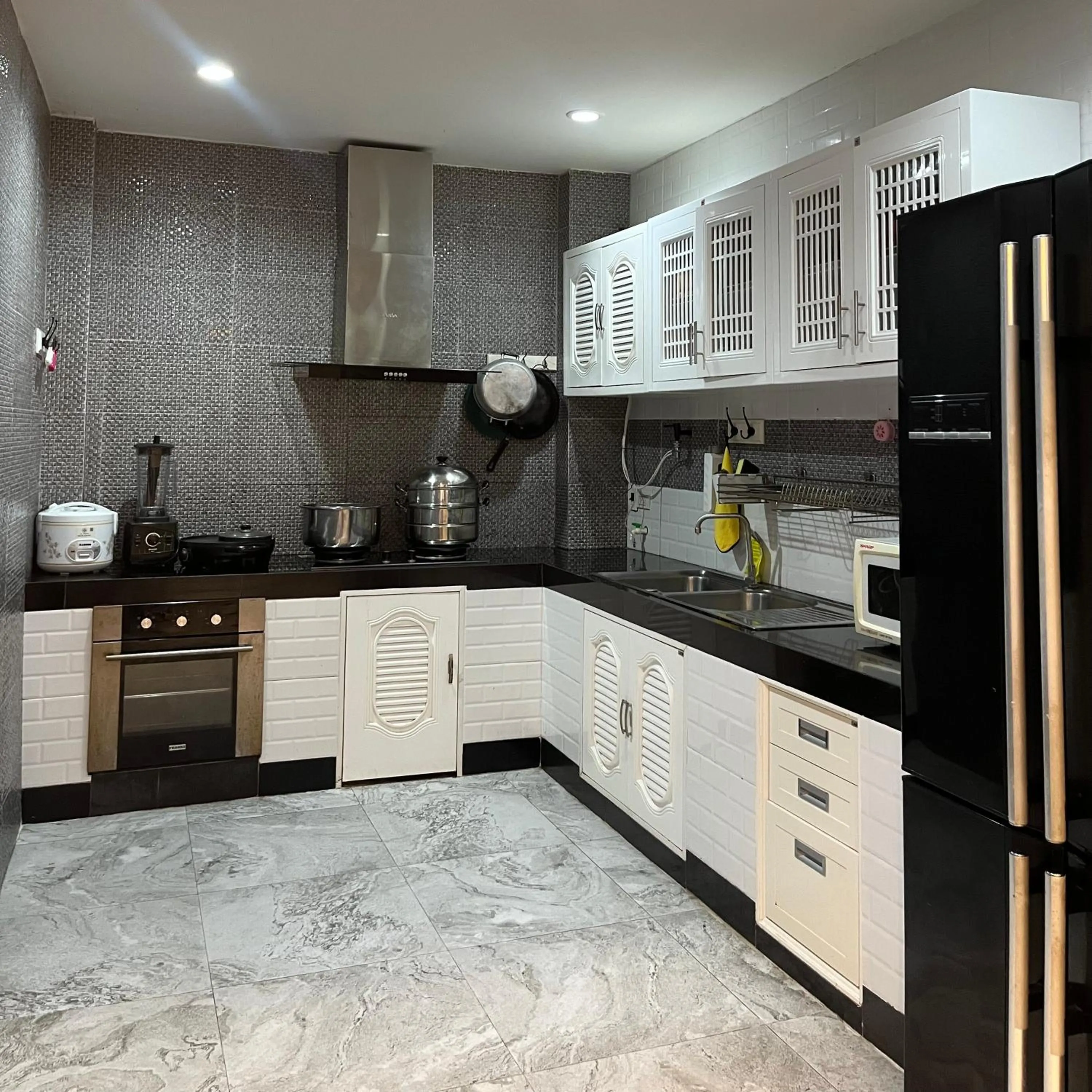 kitchen in Nice Villa Resort Hat Yai