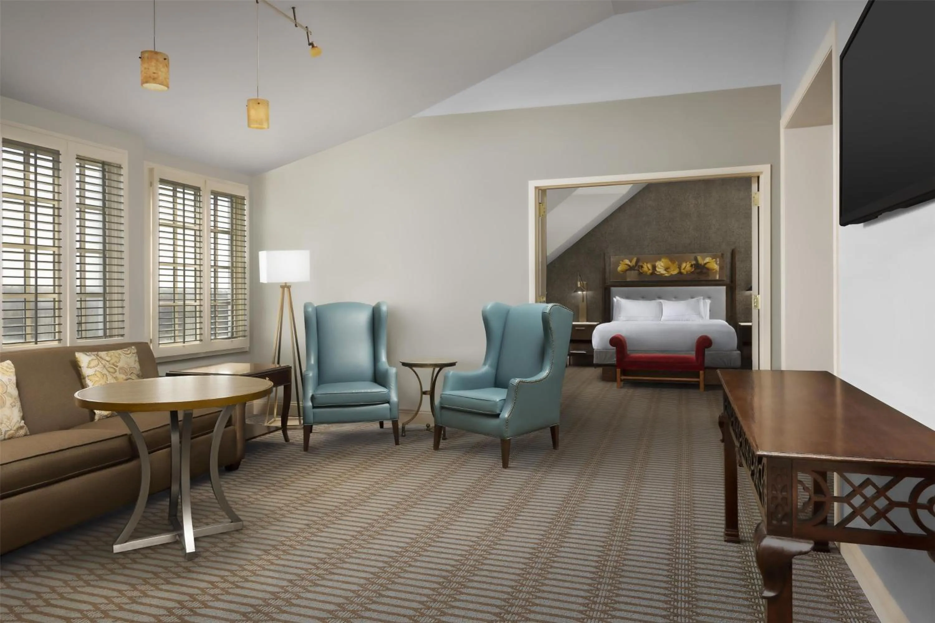 Living room in Virginia Crossings Hotel, Tapestry Collection by Hilton