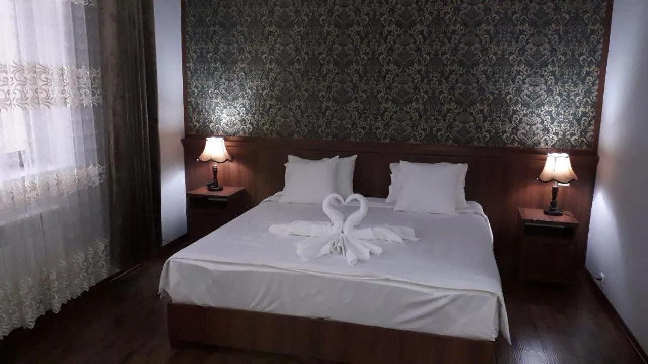 Bed in Erkin Palace Hotel