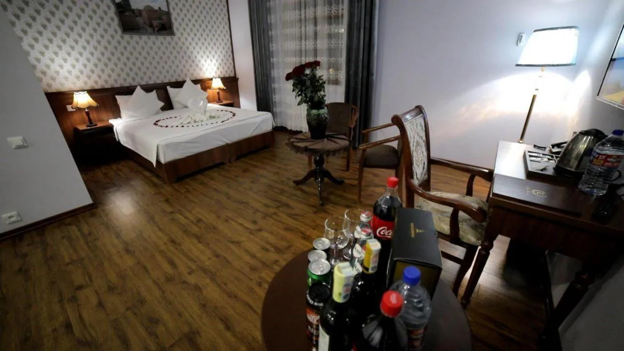 Bed in Erkin Palace Hotel