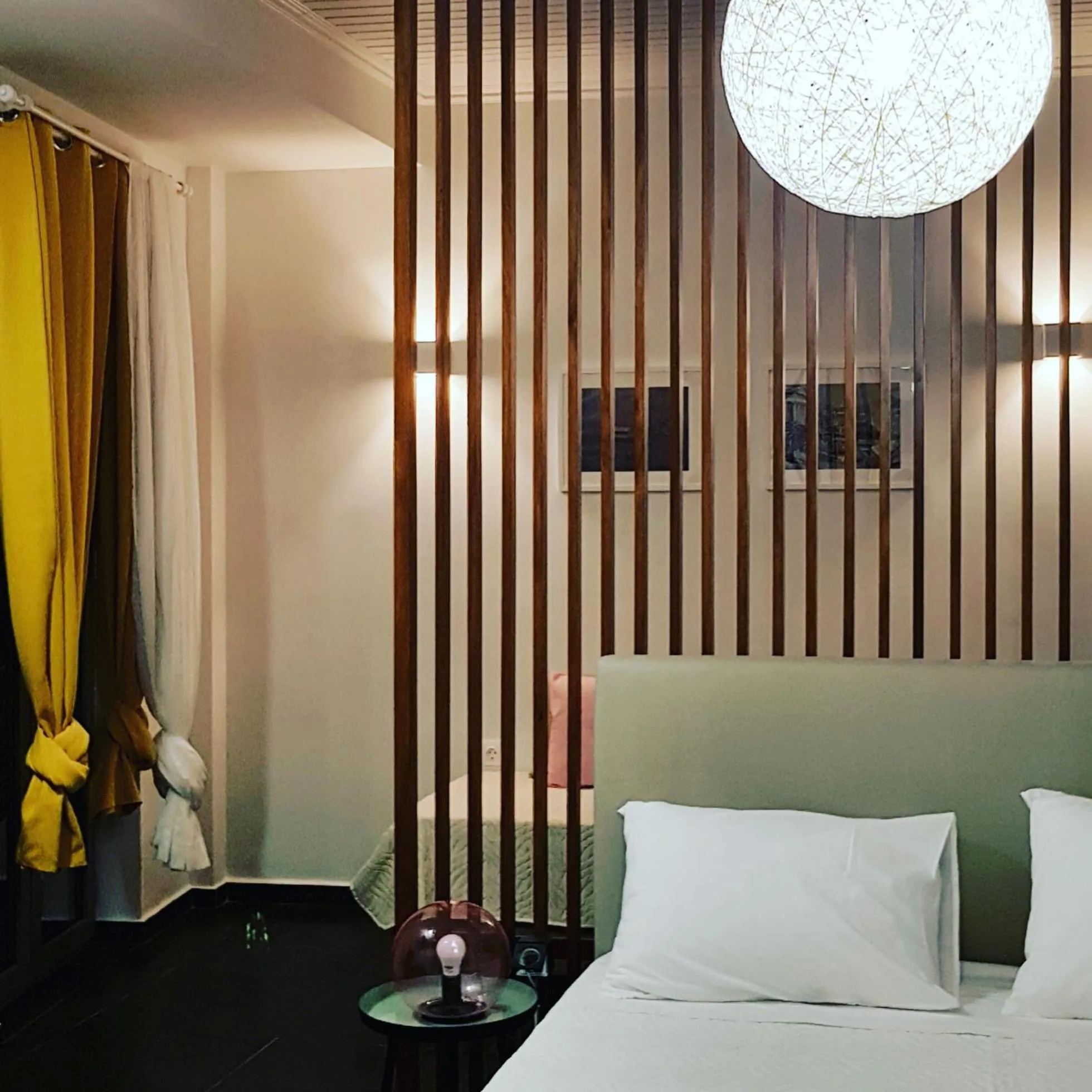 Bed in Rotunda Suites