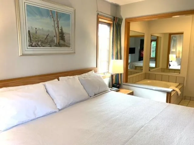 Bed in AppleCreek Resort-Hotel & Suites