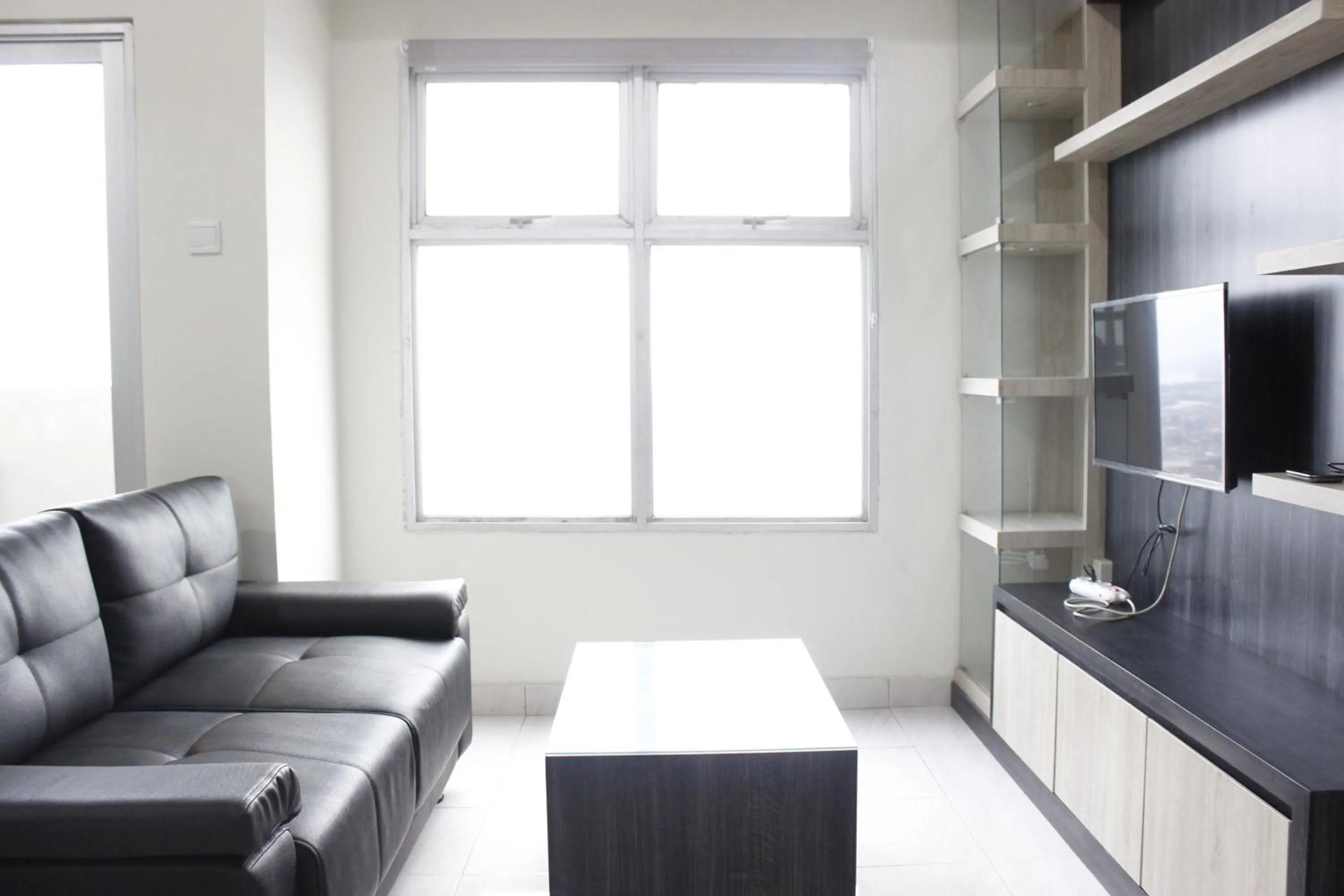 Cozy 2BR Apartment @ Newton Residence By Travelio