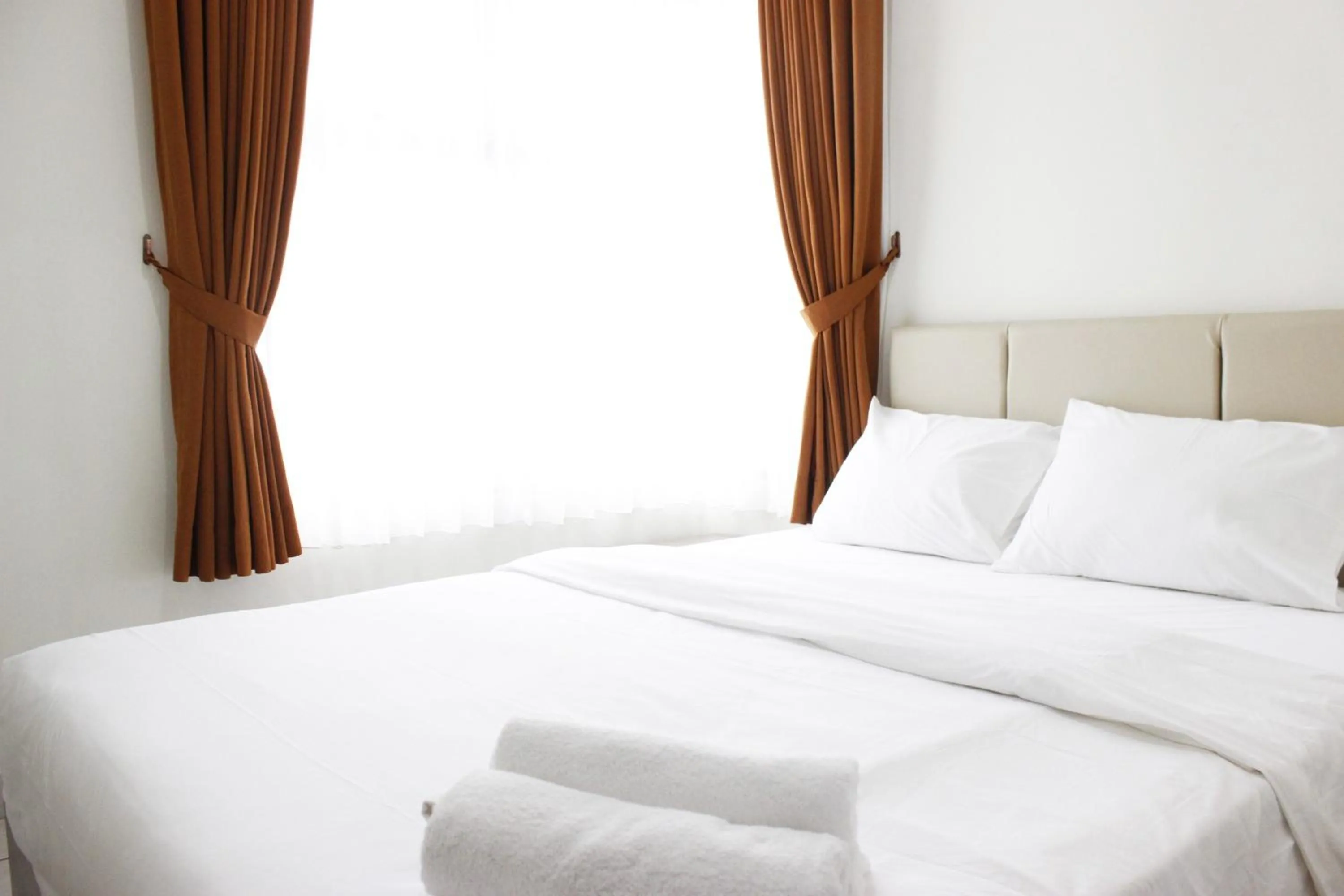 Bedroom, Bed in Cozy 2BR Apartment @ Newton Residence By Travelio