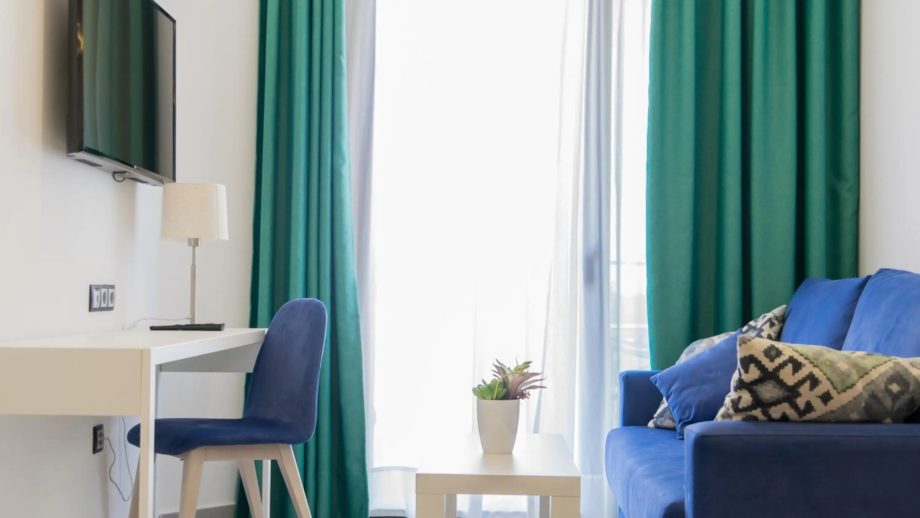 Communal lounge/ TV room in Hotel Playa de la Plata